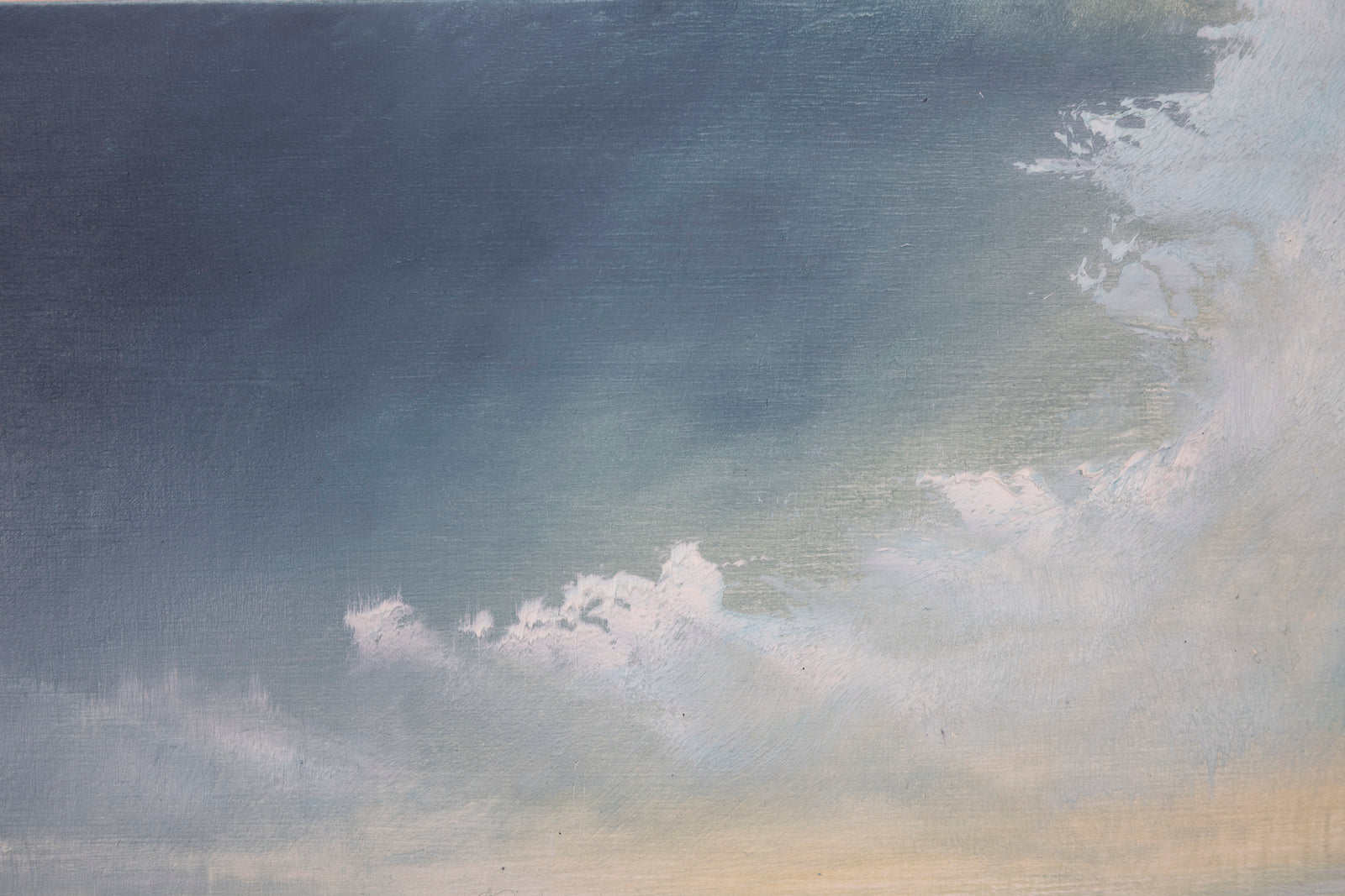 Gradient sky with dark blue at the top transitioning to lighter blue and white towards the bottom.