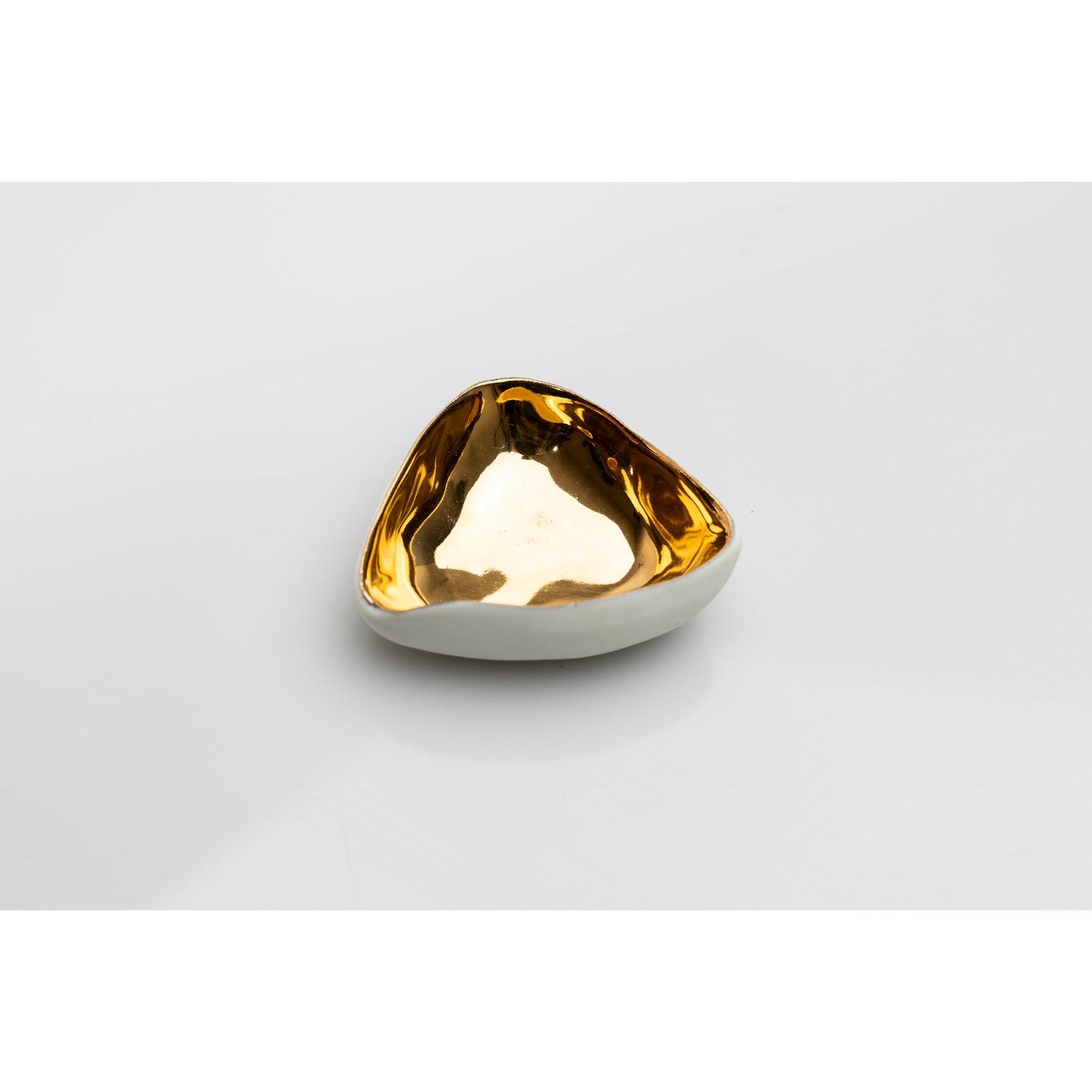 PL08 Shallow Three Sided Bowl, white porcelain and gold lustre by Penny Little. Available at Padstow Gallery, Cornwall