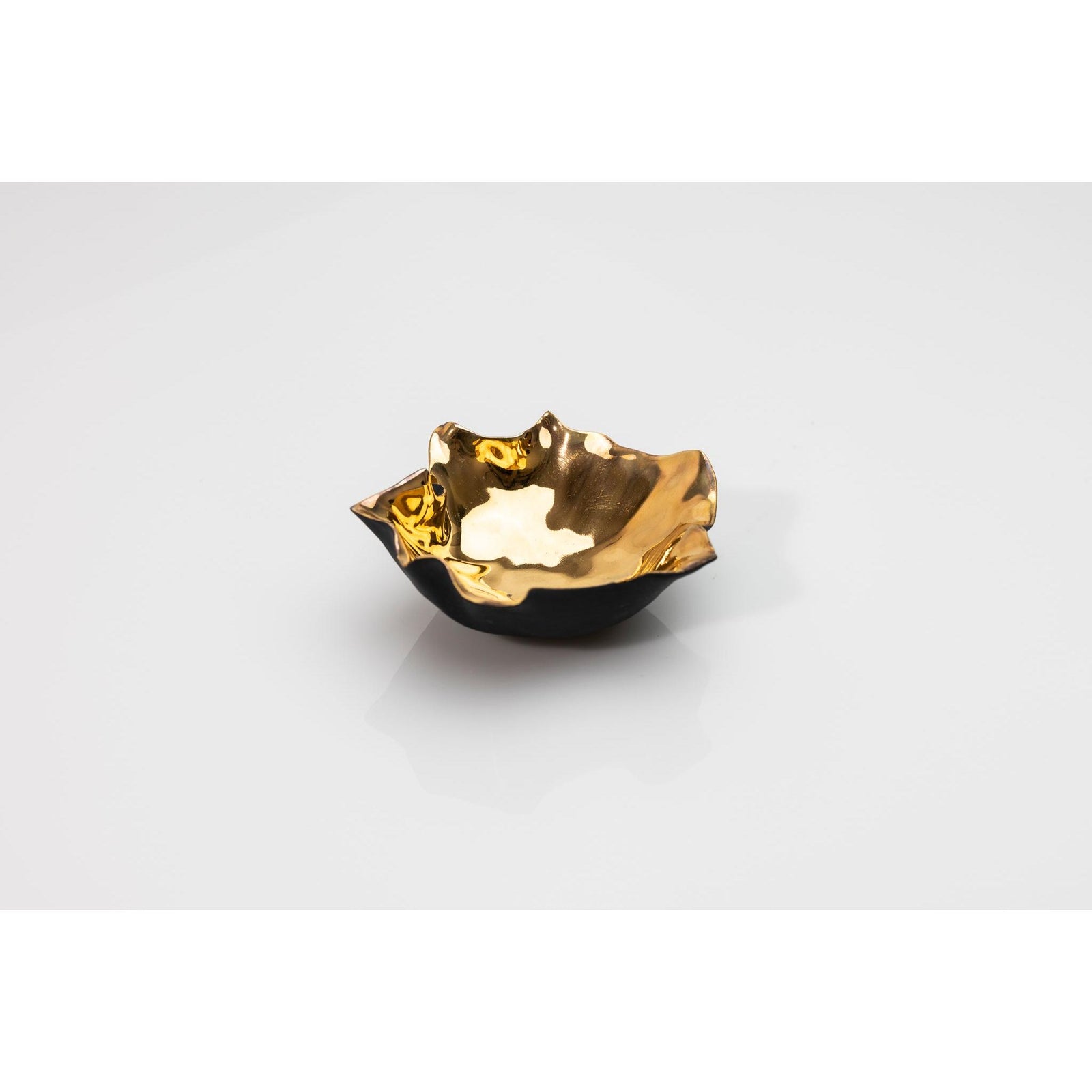PL05 Open Form, black porcelain and gold lustre by Penny Little. Available at Padstow Gallery, Cornwall