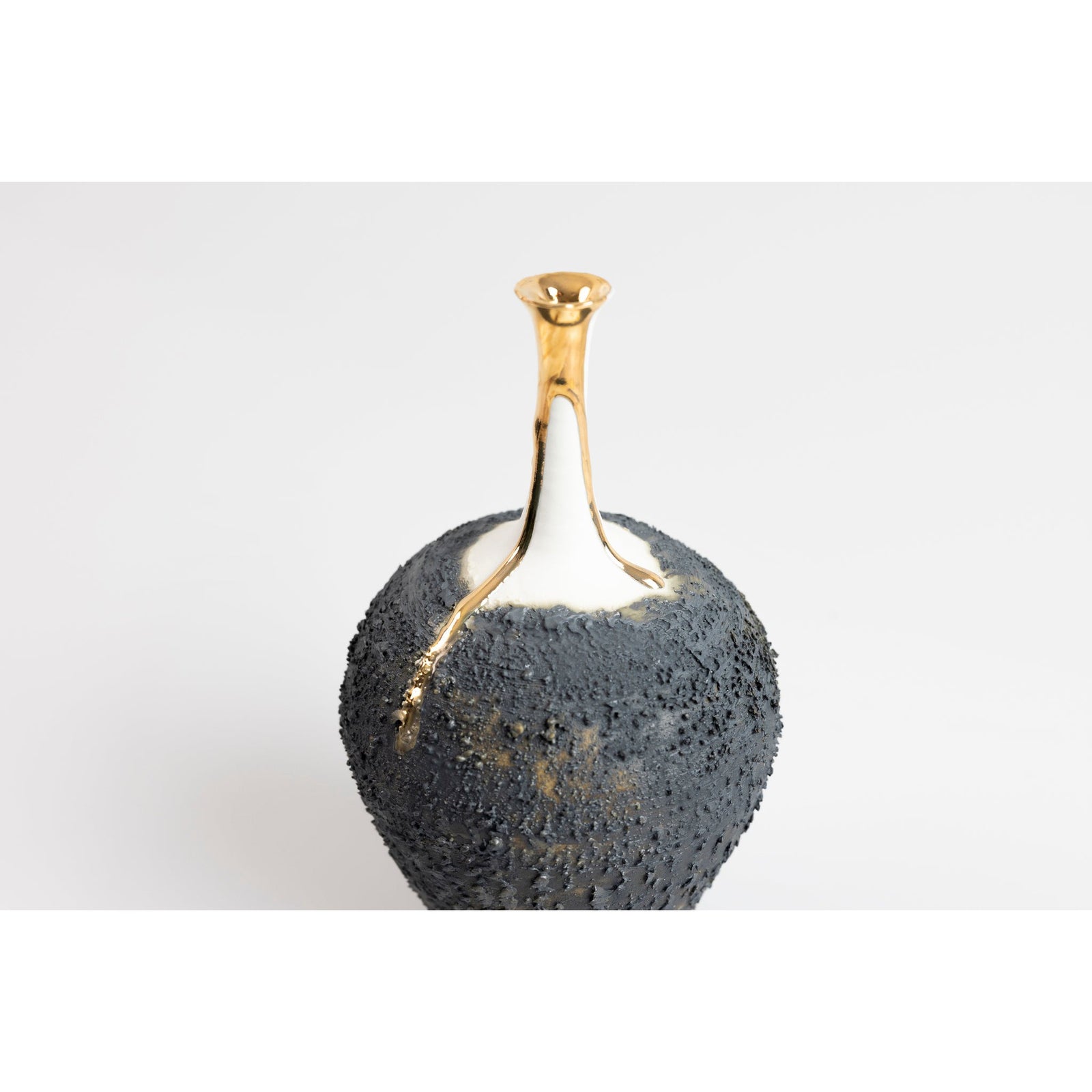 Textured long necked vase with gold lustre, by Alex McCarthy, available at Padstow Gallery, Cornwall