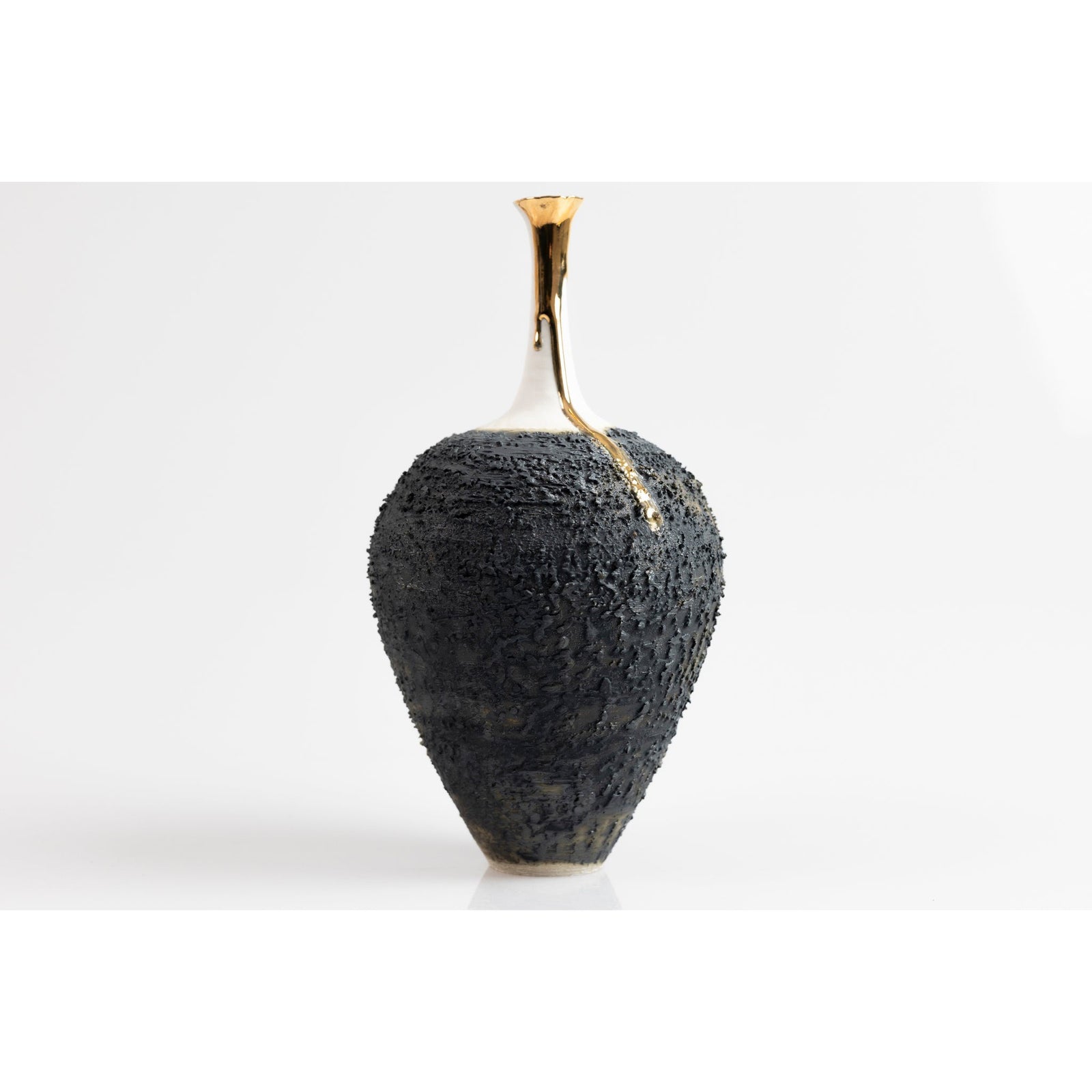 Textured long necked vase with gold lustre, by Alex McCarthy, available at Padstow Gallery, Cornwall