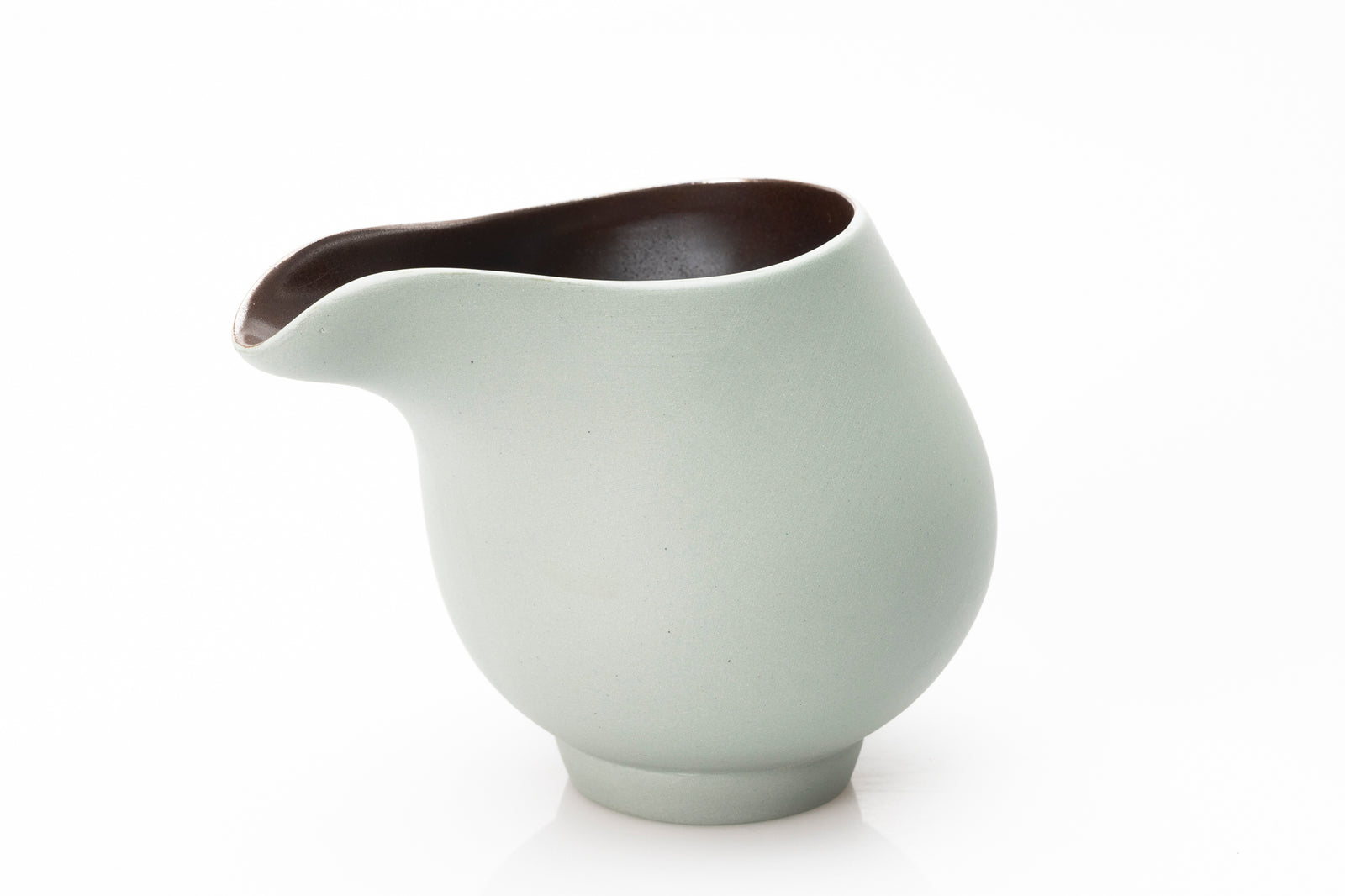 Sage green flow jug by Kate Schuricht ceramics, available at Padstow Gallery Cornwall