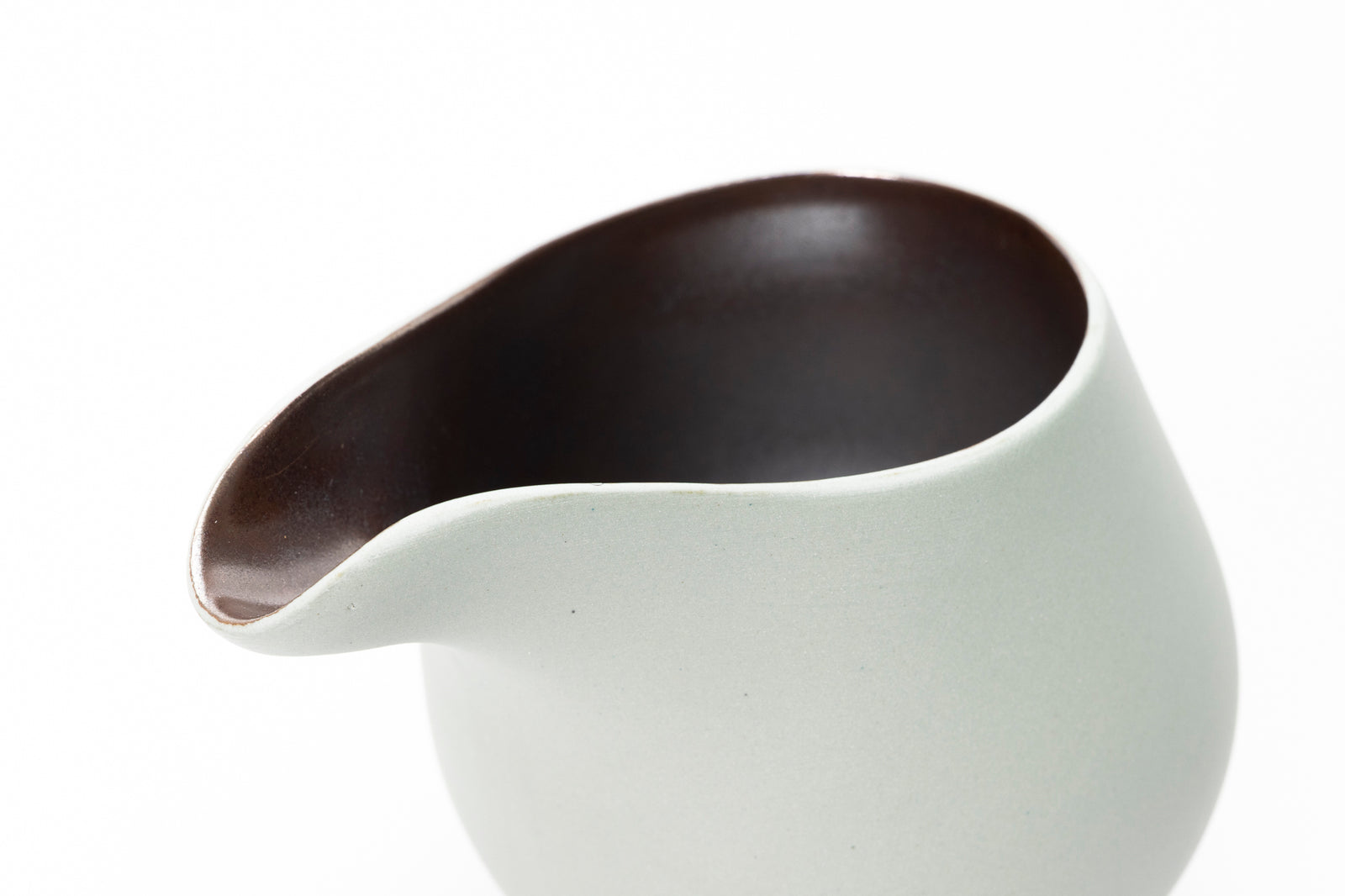 Sage green flow jug by Kate Schuricht ceramics, available at Padstow Gallery Cornwall