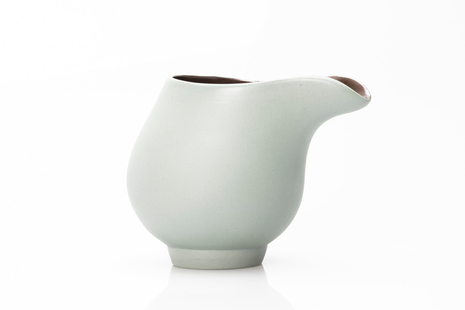 Sage green flow jug by Kate Schuricht ceramics, available at Padstow Gallery Cornwall