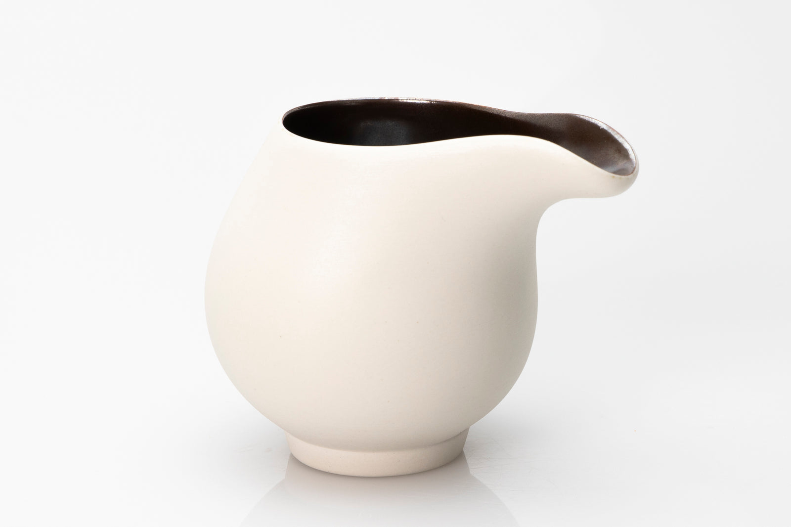 White flow jug by Kate Schuricht ceramics, available at Padstow Gallery Cornwall