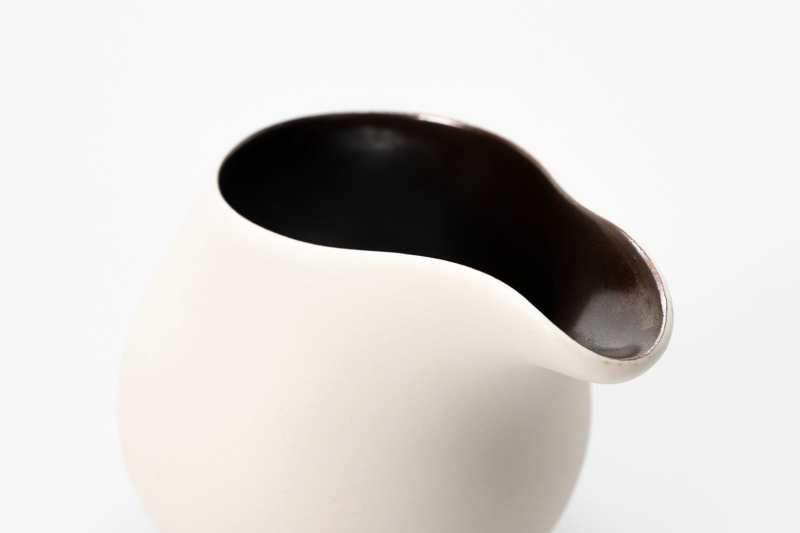 White flow jug by Kate Schuricht ceramics, available at Padstow Gallery Cornwall