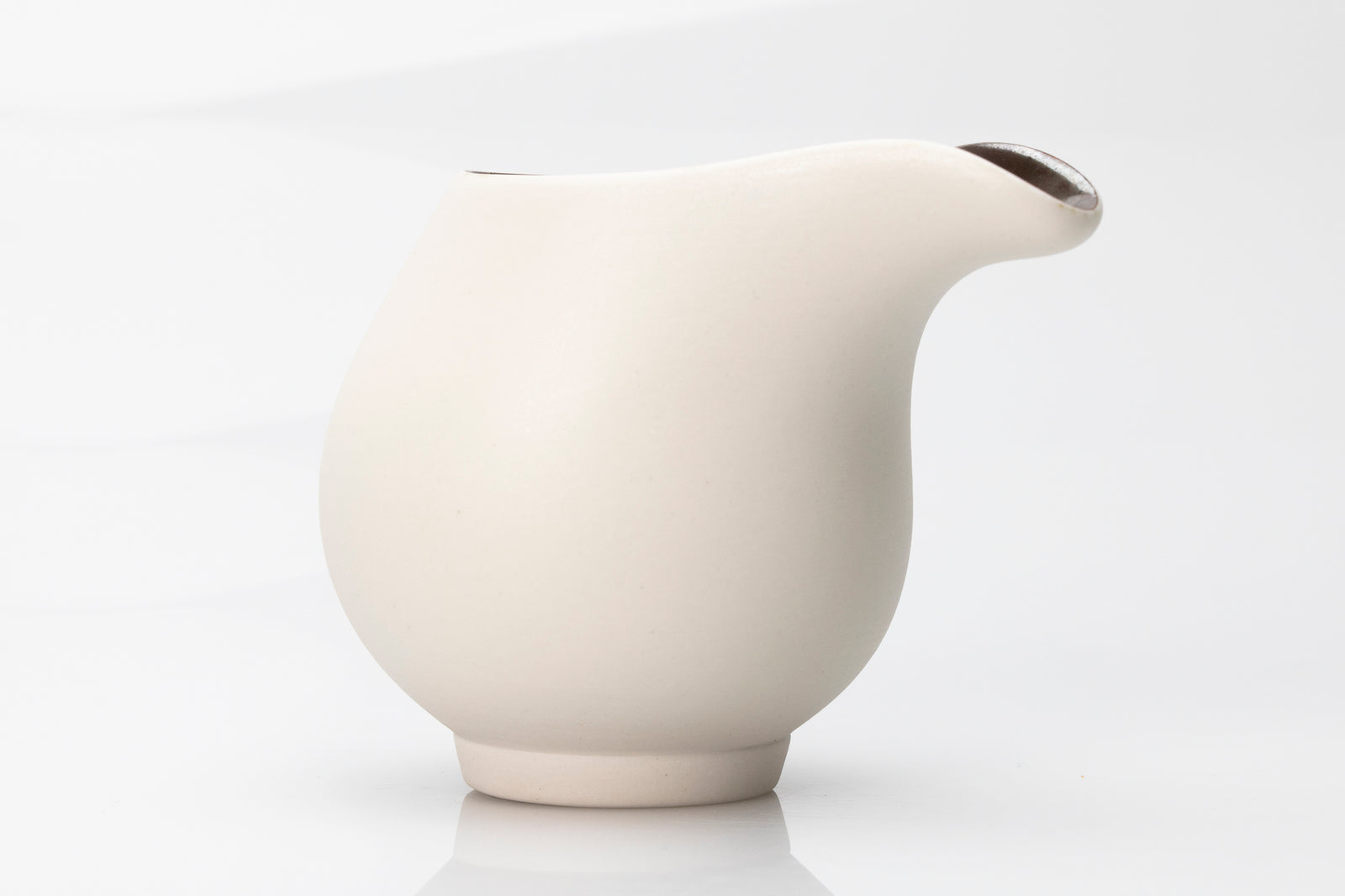 White flow jug by Kate Schuricht ceramics, available at Padstow Gallery Cornwall