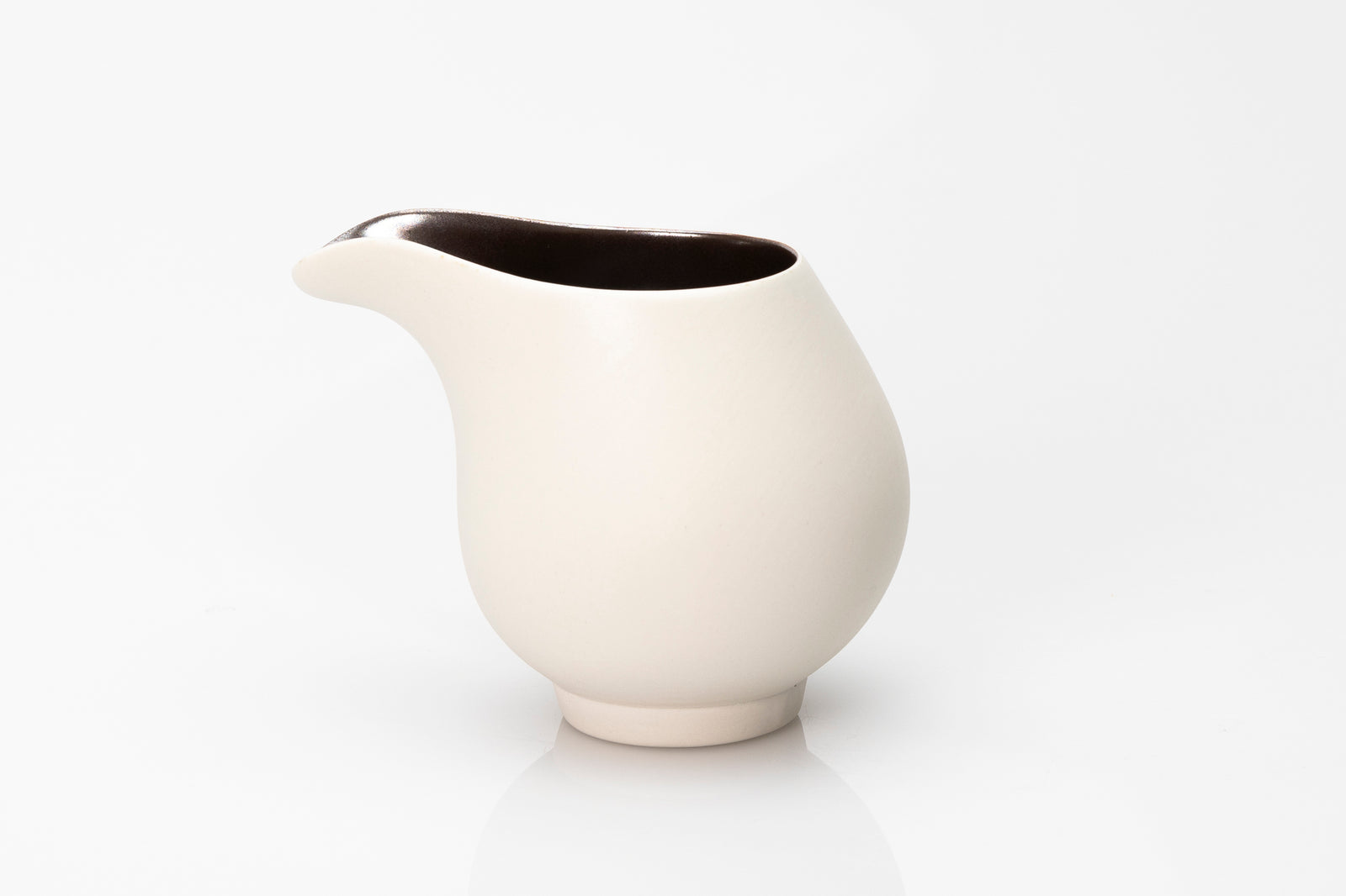 White flow jug by Kate Schuricht ceramics, available at Padstow Gallery Cornwall