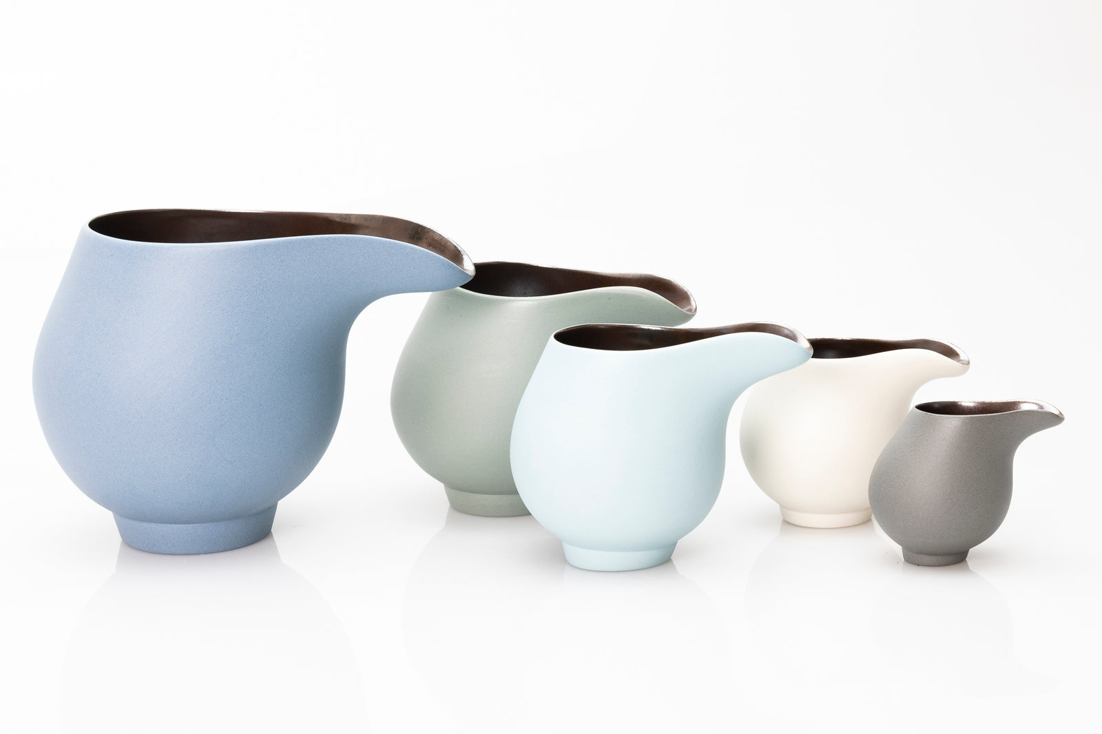 Sage green flow jug by Kate Schuricht ceramics, available at Padstow Gallery Cornwall