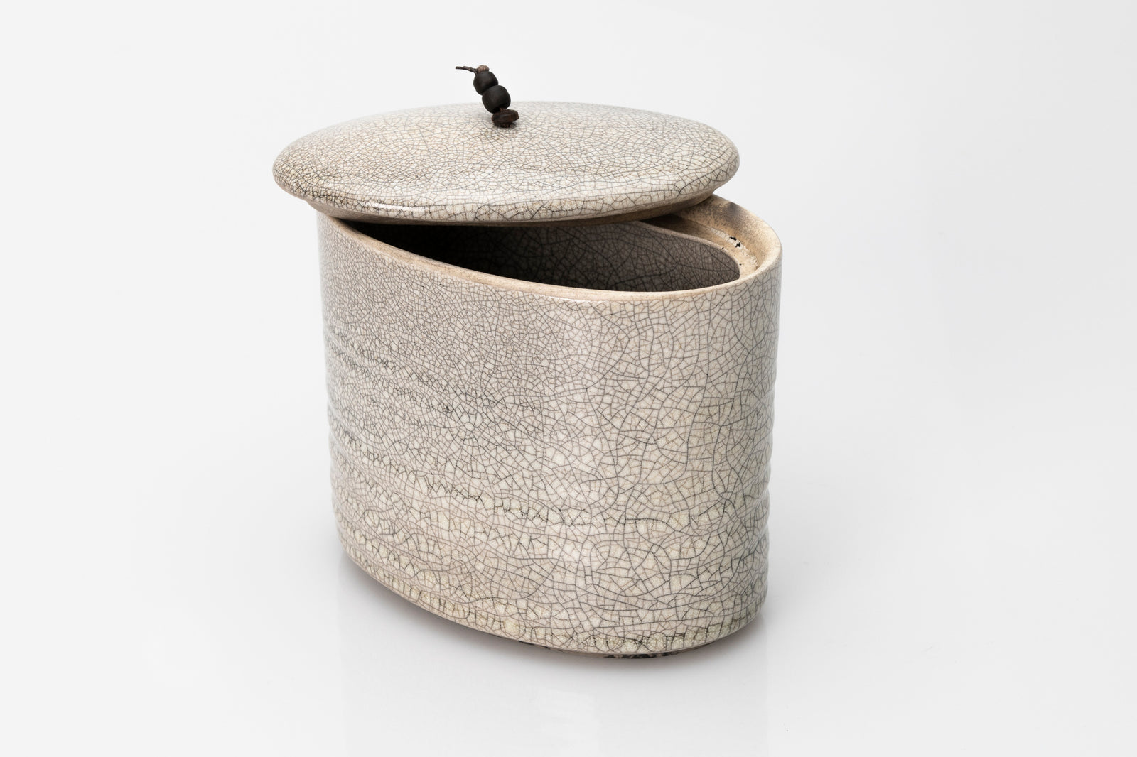 Raku oval container by Kate Schuricht ceramics, available at Padstow Gallery Cornwall