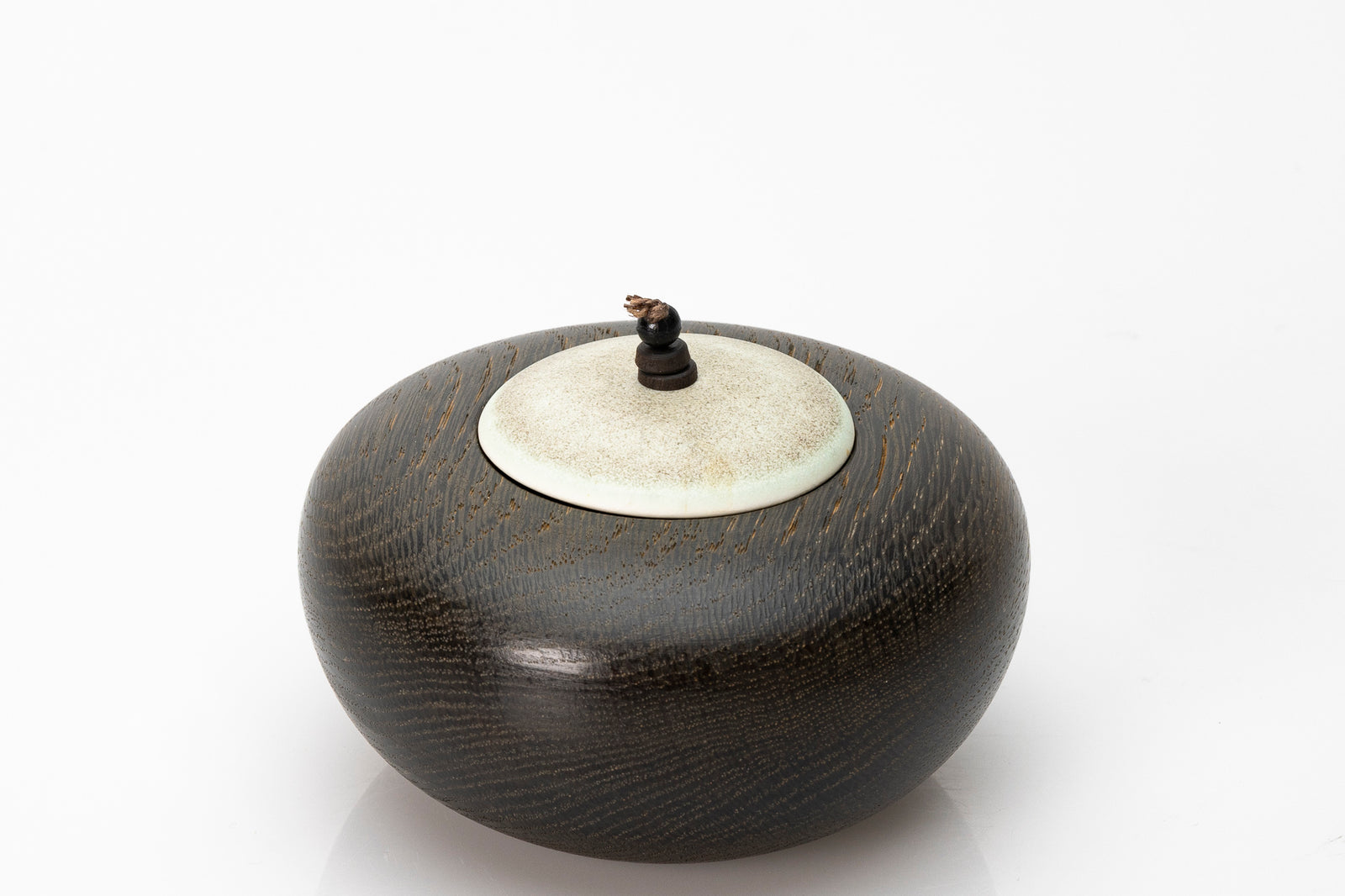 Ebonised oak pebble pot by Kate Schuricht ceramics, available at Padstow Gallery Cornwall
