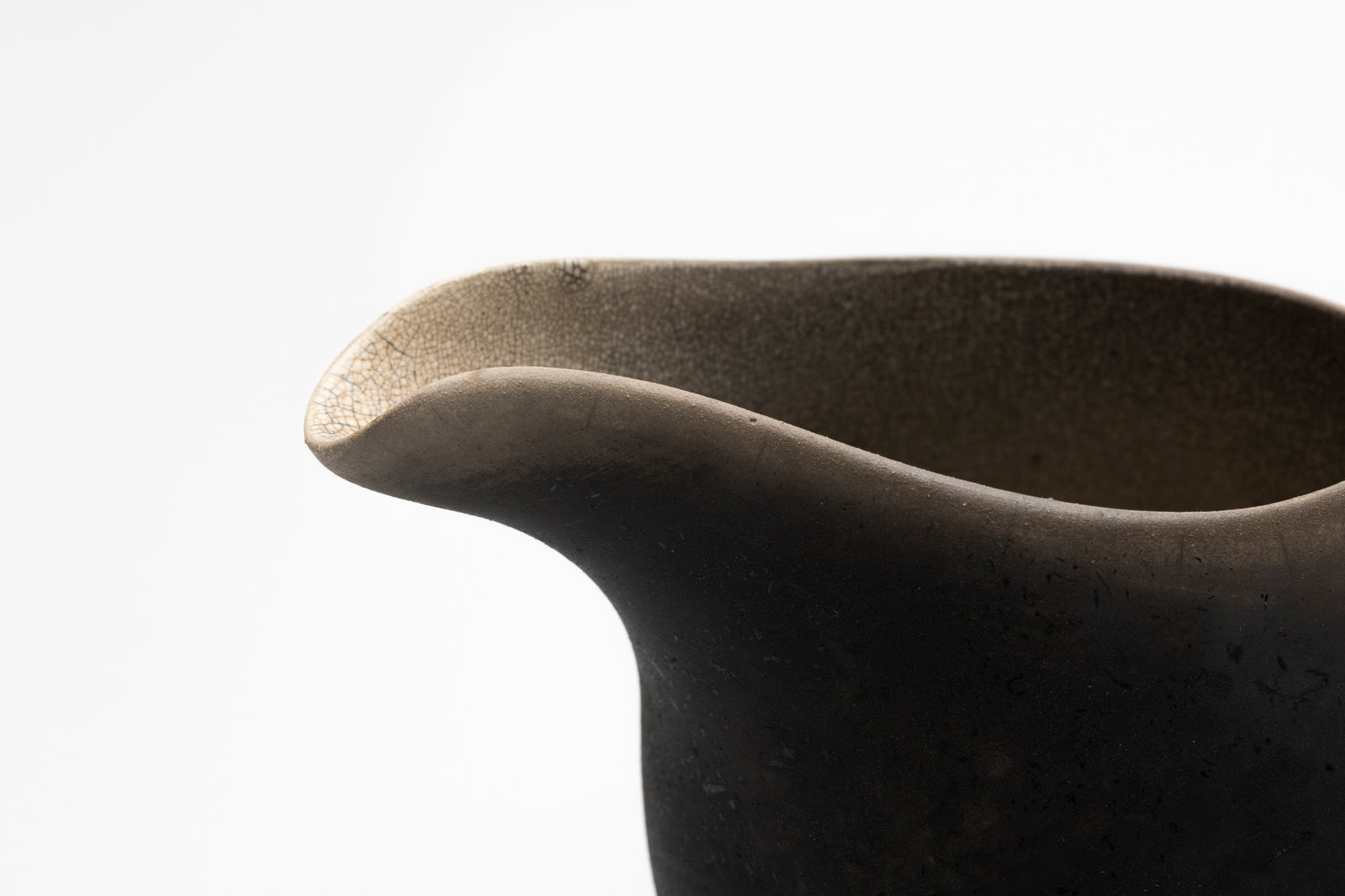 Raku flow jug by Kate Schuricht ceramics, available at Padstow Gallery Cornwall