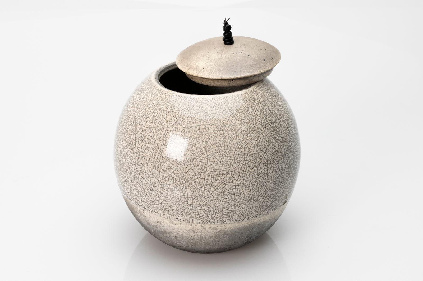 Raku Luna Sphere pot by Kate Schuricht ceramics, available at Padstow Gallery Cornwall