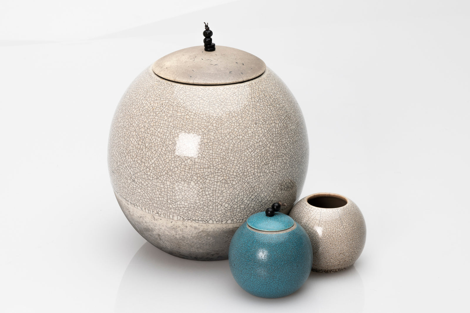 Raku Luna Sphere pot by Kate Schuricht ceramics, available at Padstow Gallery Cornwall