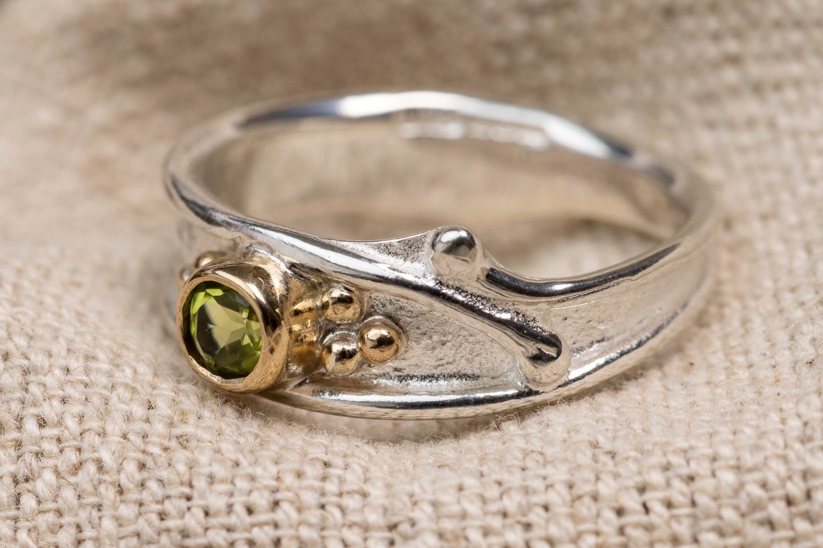 LG 135 Peridot Ring Size N 1/2 by Les Grimshaw available at Padstow Gallery Cornwall