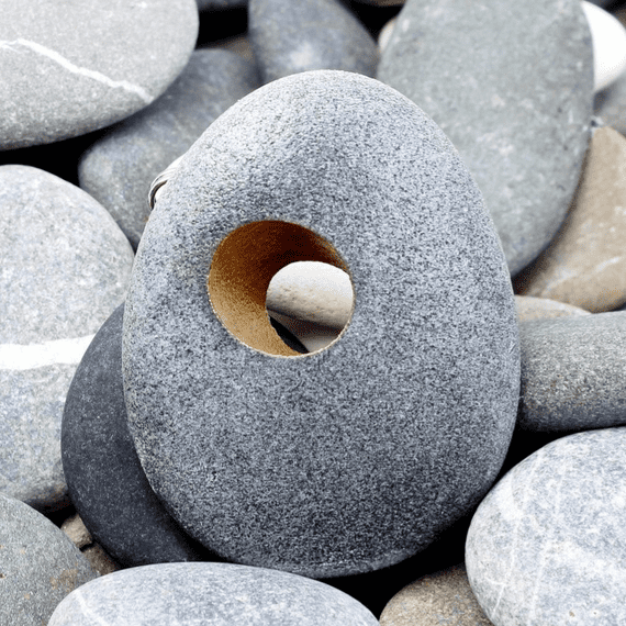 Hole Pebble Brooch by John and Dawn Field, available at Padstow Gallery, Cornwall