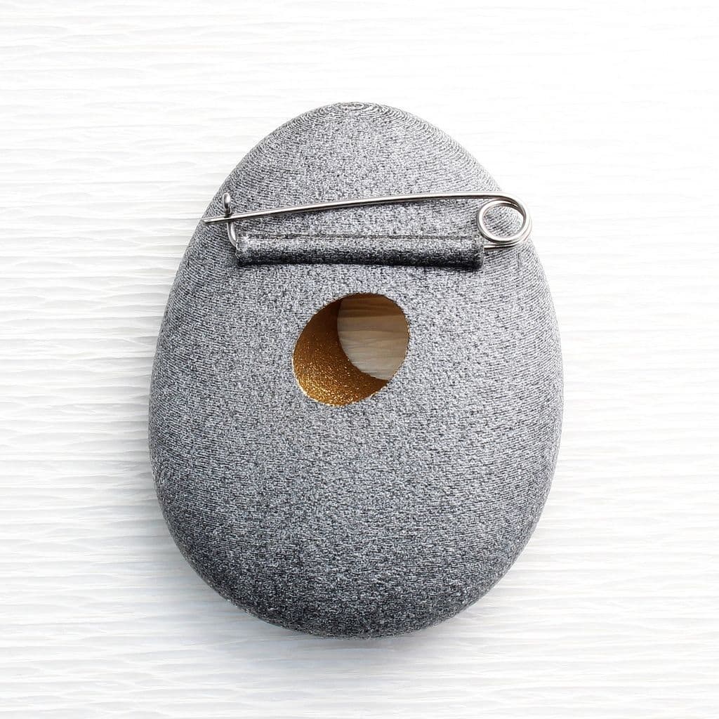Hole Pebble Brooch by John and Dawn Field, available at Padstow Gallery, Cornwall