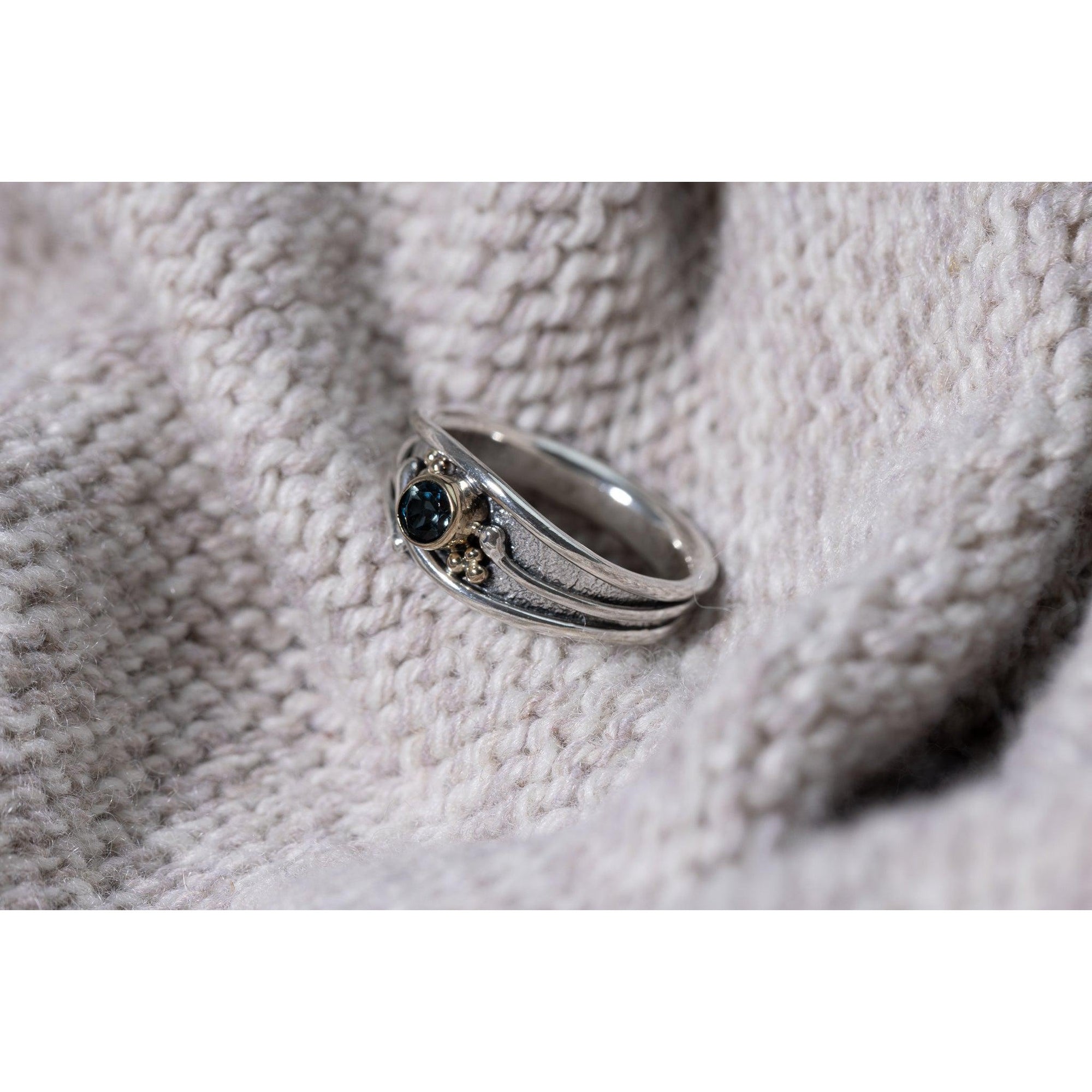 'LG65 - Silver Ring with 9ct Gold 4mm London Blue Topaz Ring ' by Les Grimshaw, available at Padstow Gallery, Cornwall