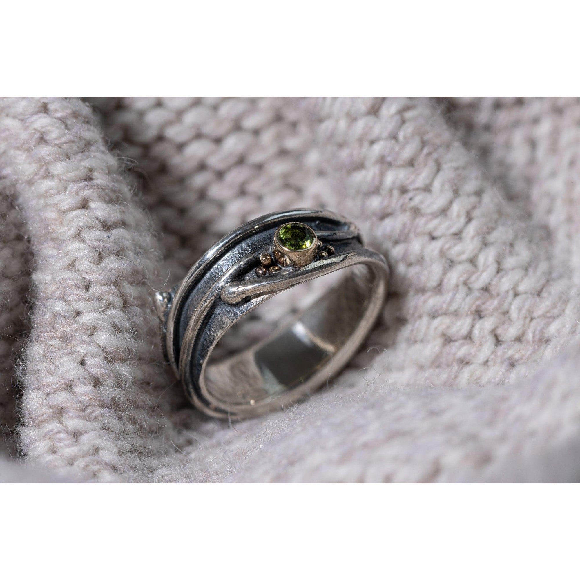 'LG66 - Silver Ring with 9ct Gold 3.5mm Peridot Ring ' by Les Grimshaw, available at Padstow Gallery, Cornwall