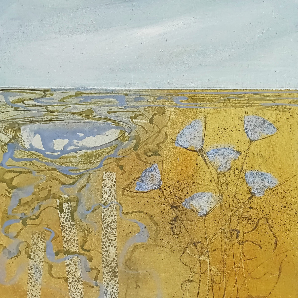 An abstract landscape painting featuring a golden-brown field with blue-gray water, ripples, and several blue-gray leaf-like shapes, under a pale blue sky.