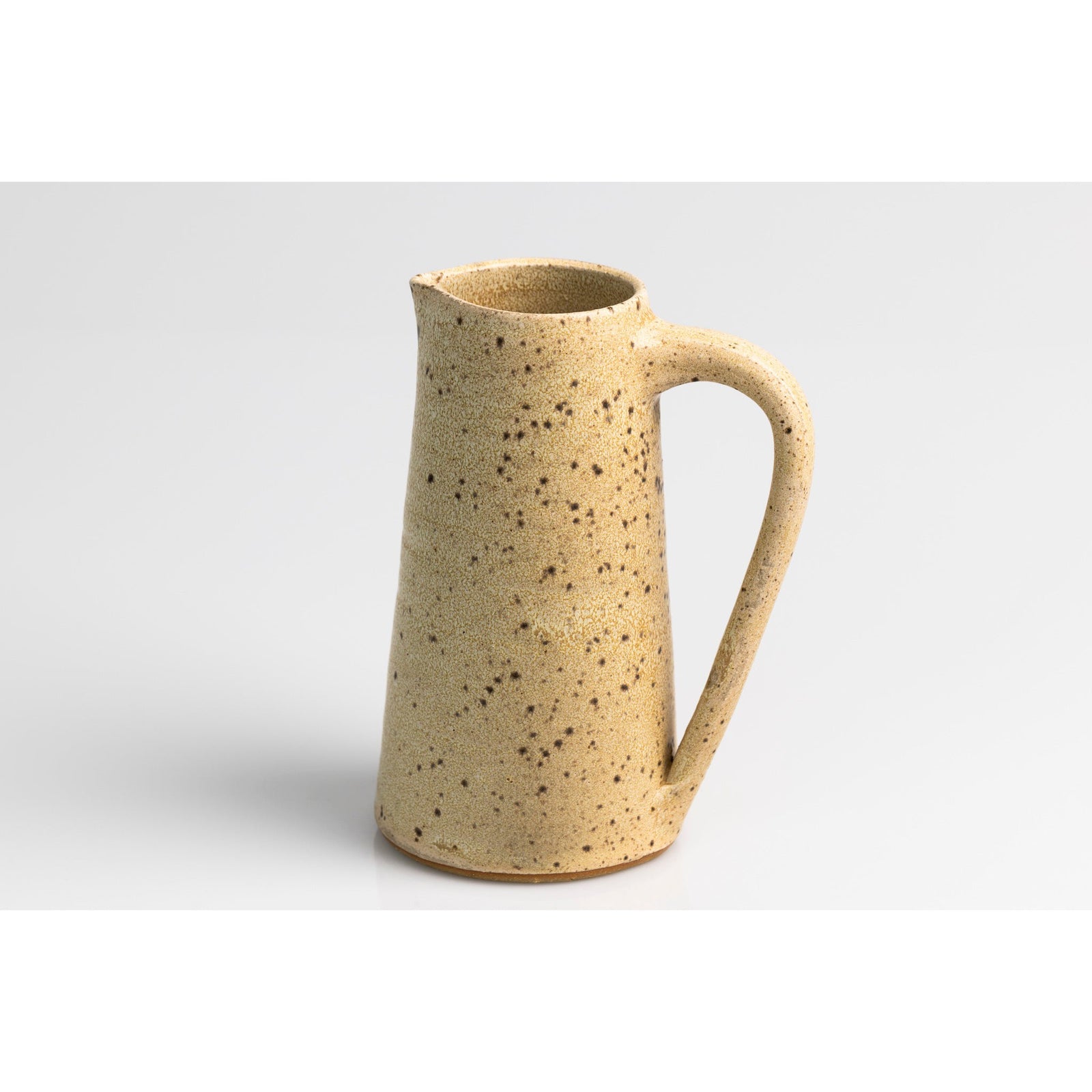 GC09 Cream Speckled Tall Handled Pitcher by Gail Cooper, available at Padstow Gallery, Cornwall