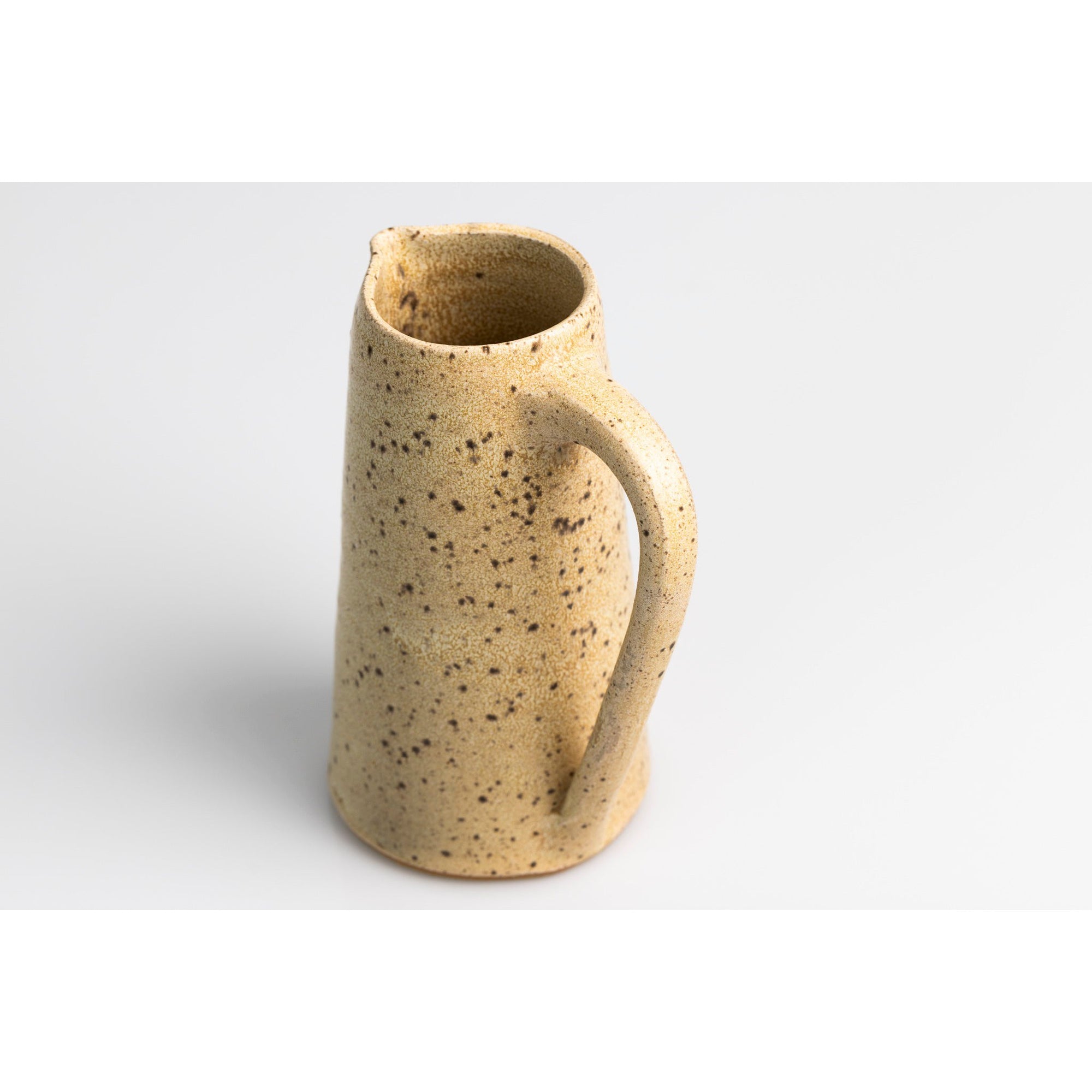 GC09 Cream Speckled Tall Handled Pitcher by Gail Cooper, available at Padstow Gallery, Cornwall