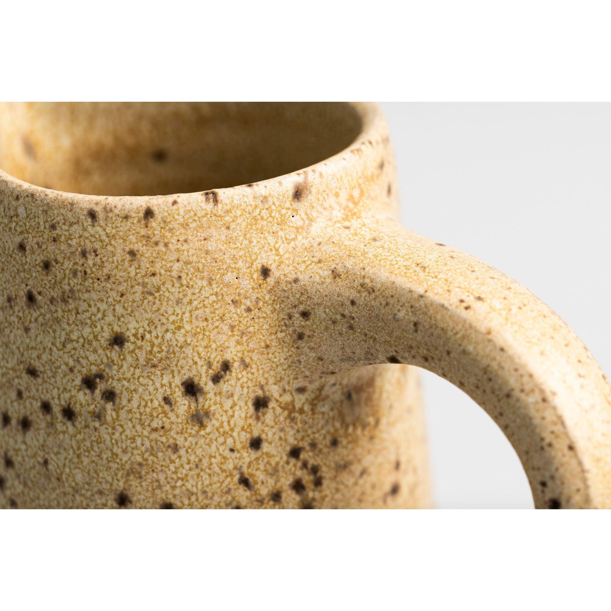 GC09 Cream Speckled Tall Handled Pitcher by Gail Cooper, available at Padstow Gallery, Cornwall