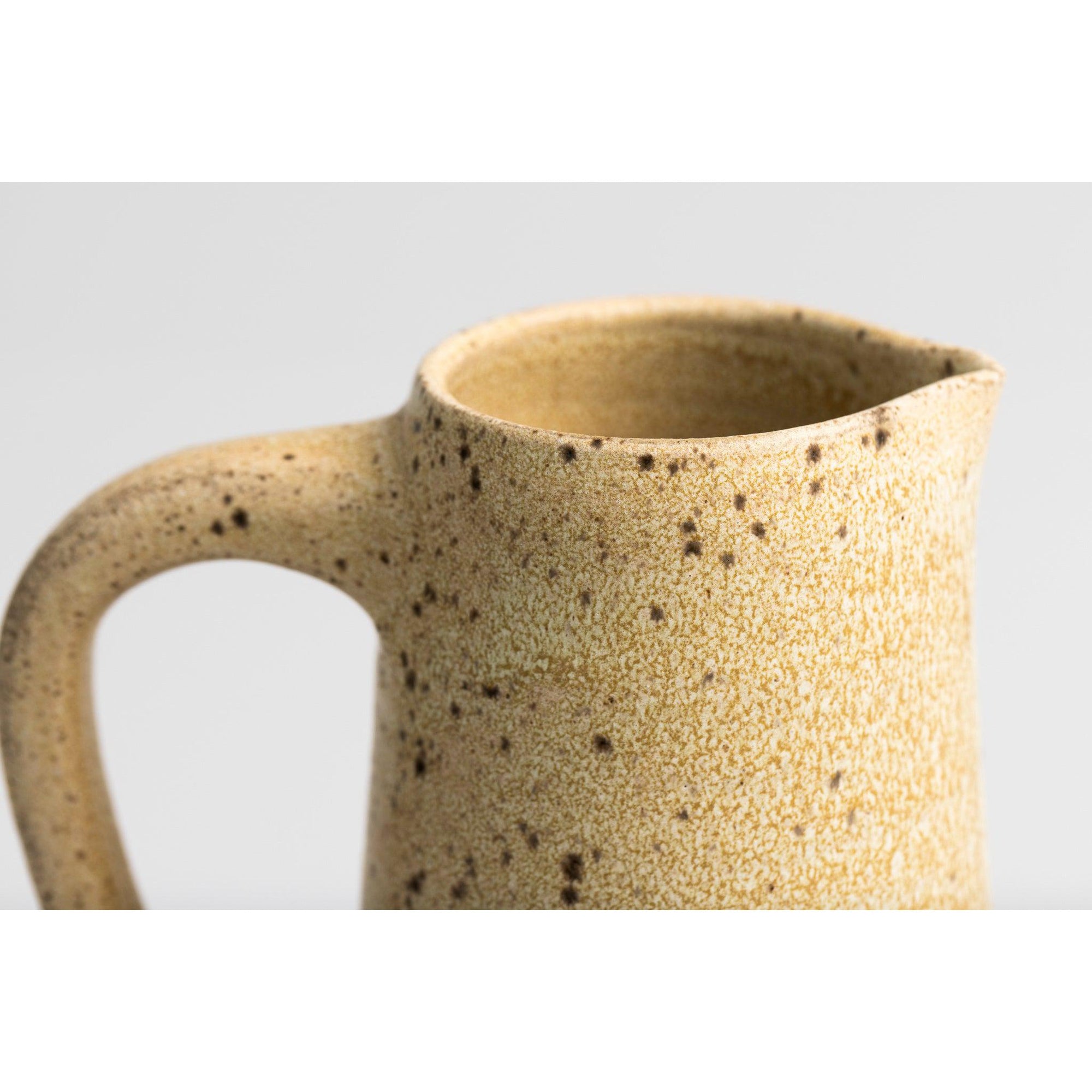 GC09 Cream Speckled Tall Handled Pitcher by Gail Cooper, available at Padstow Gallery, Cornwall