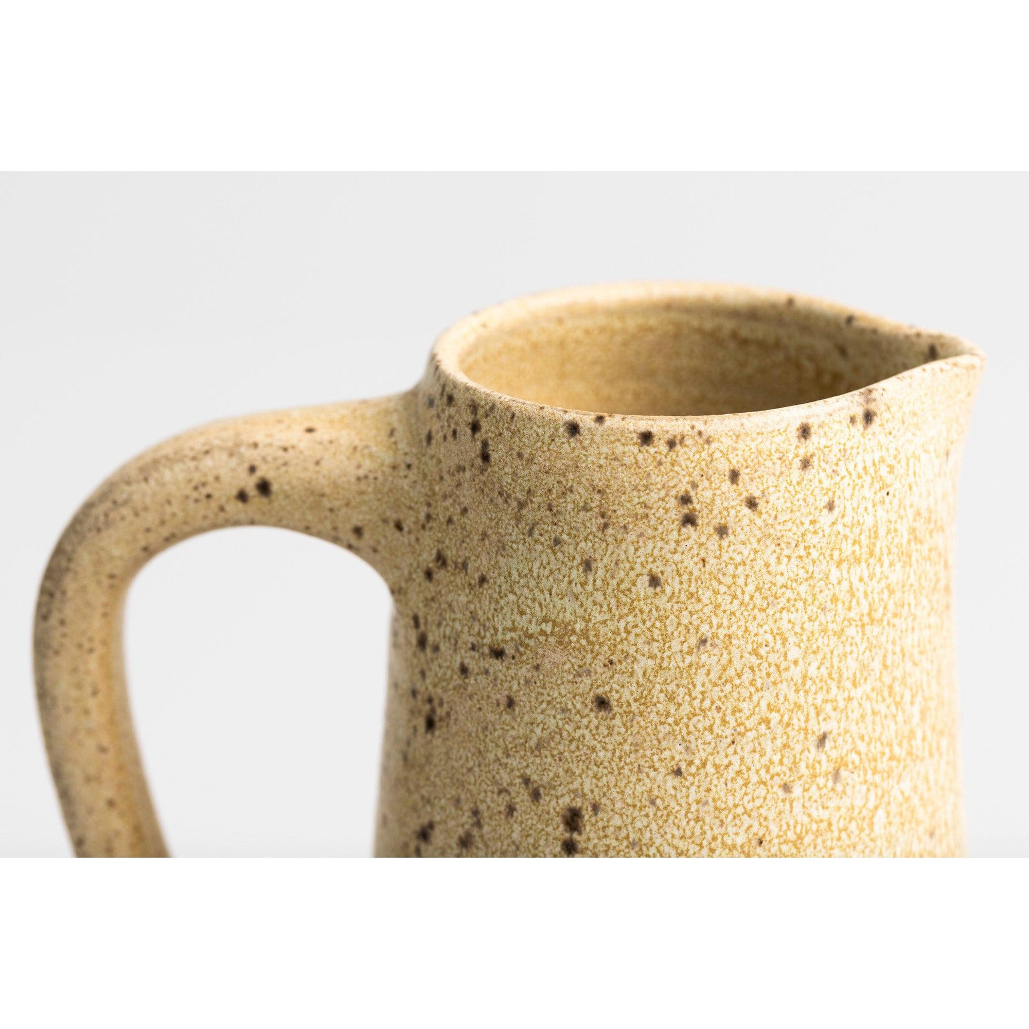 GC09 Cream Speckled Tall Handled Pitcher by Gail Cooper, available at Padstow Gallery, Cornwall