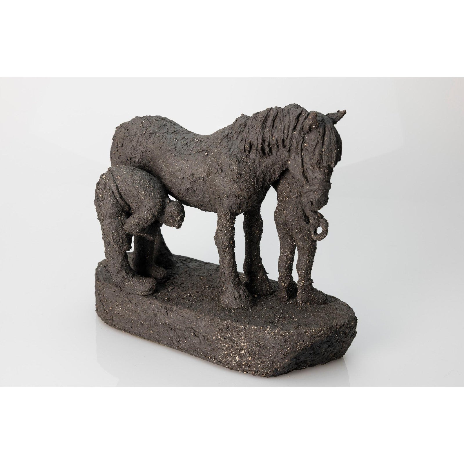 Farrier and Groom, ceramic figures, by Sophie Howard, available from Padstow Gallery, Cornwall