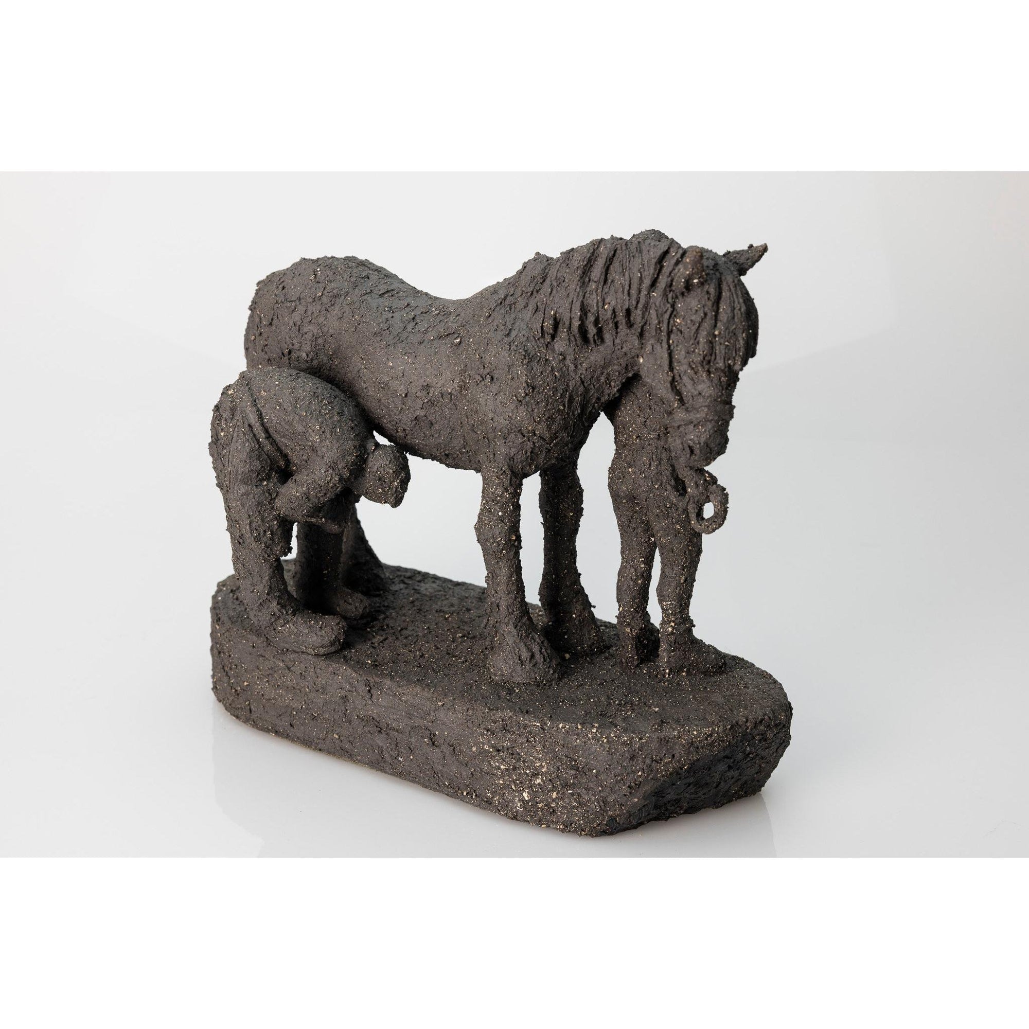 Farrier and Groom, ceramic figures, by Sophie Howard, available from Padstow Gallery, Cornwall