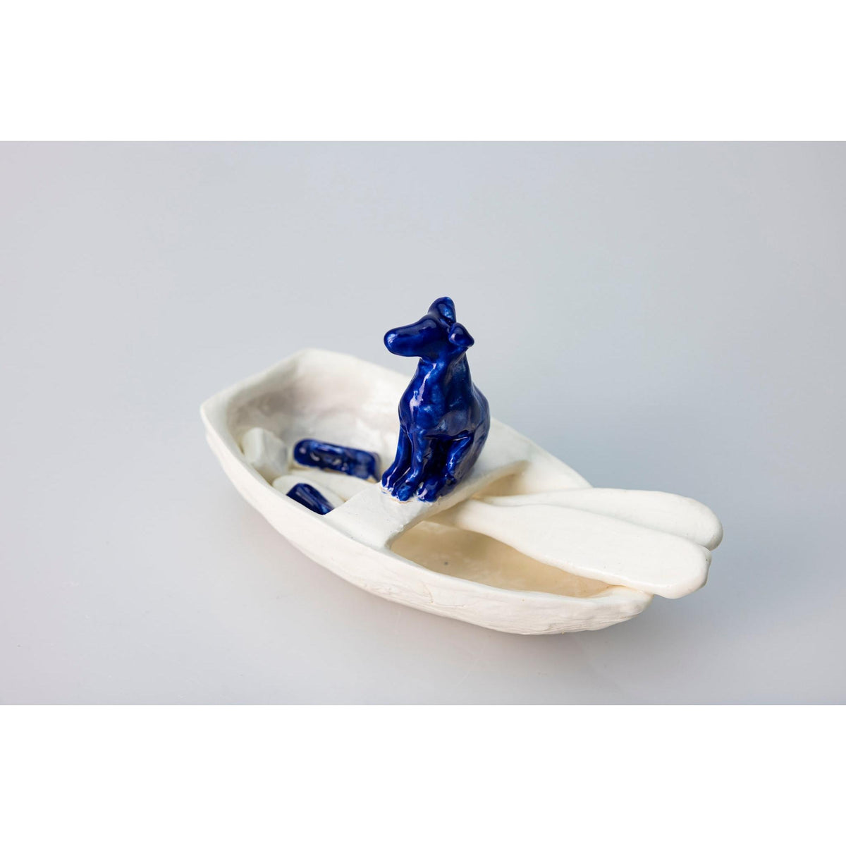 'Little Boat with Blue Dog (SH65)' Stoneware Boat by Sophie Howard, available from Padstow Gallery, Cornwall