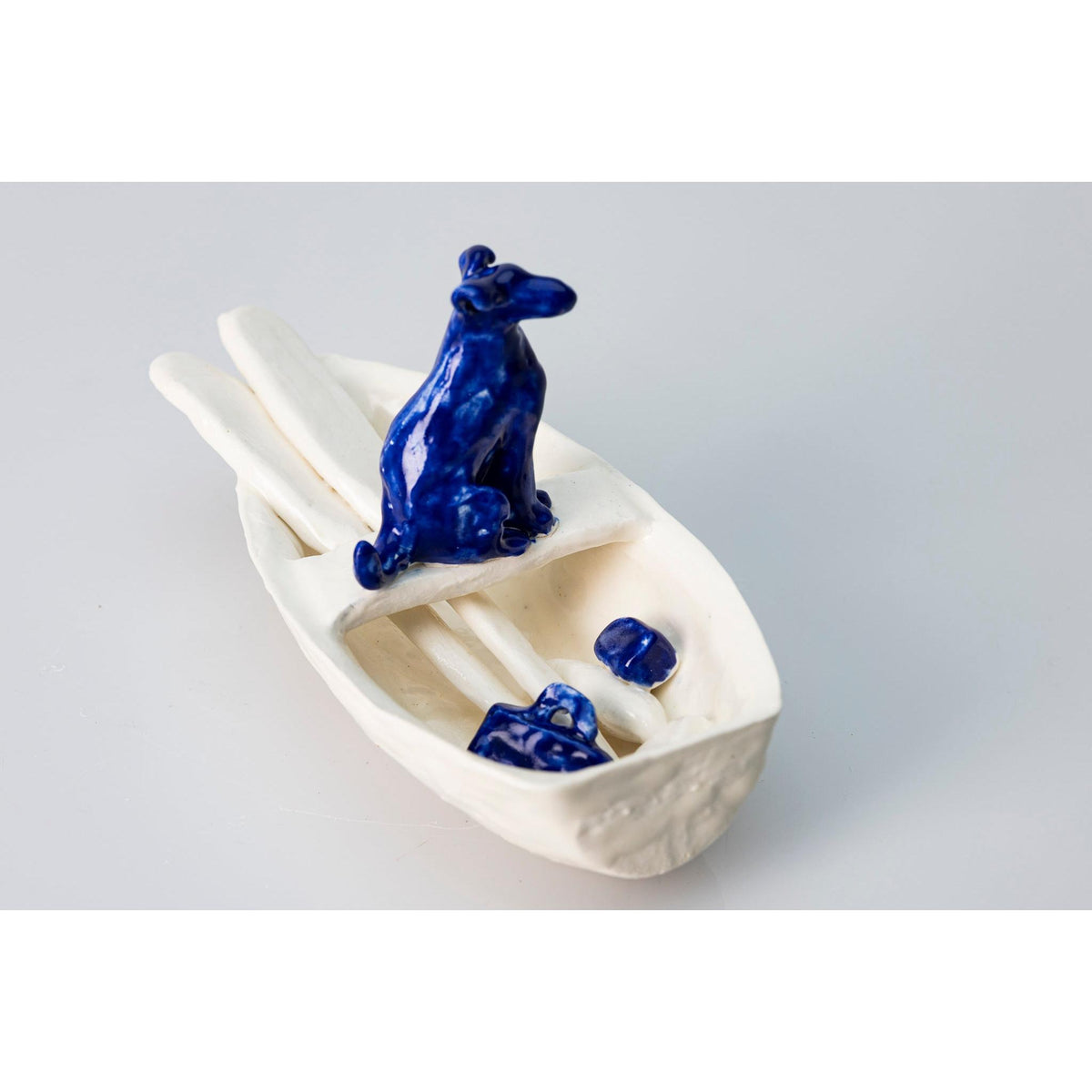 'Little Boat with Blue Dog (SH65)' Stoneware Boat by Sophie Howard, available from Padstow Gallery, Cornwall