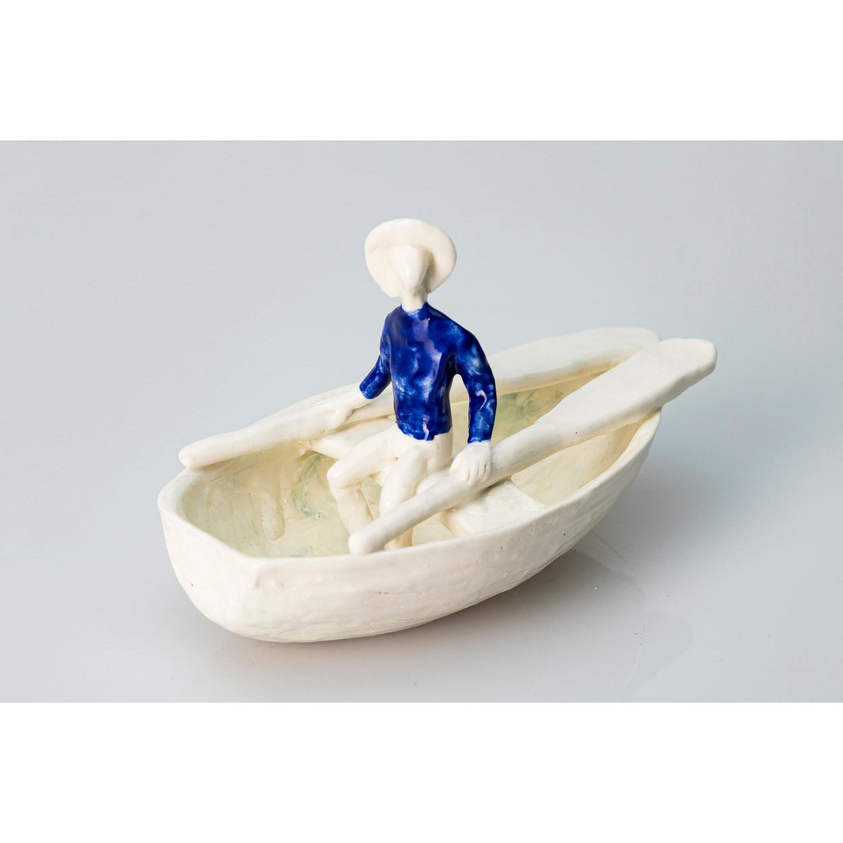 &#39;Little Boat with Blue Man (SH62)&#39; Stoneware Boat by Sophie Howard, available from Padstow Gallery, Cornwall