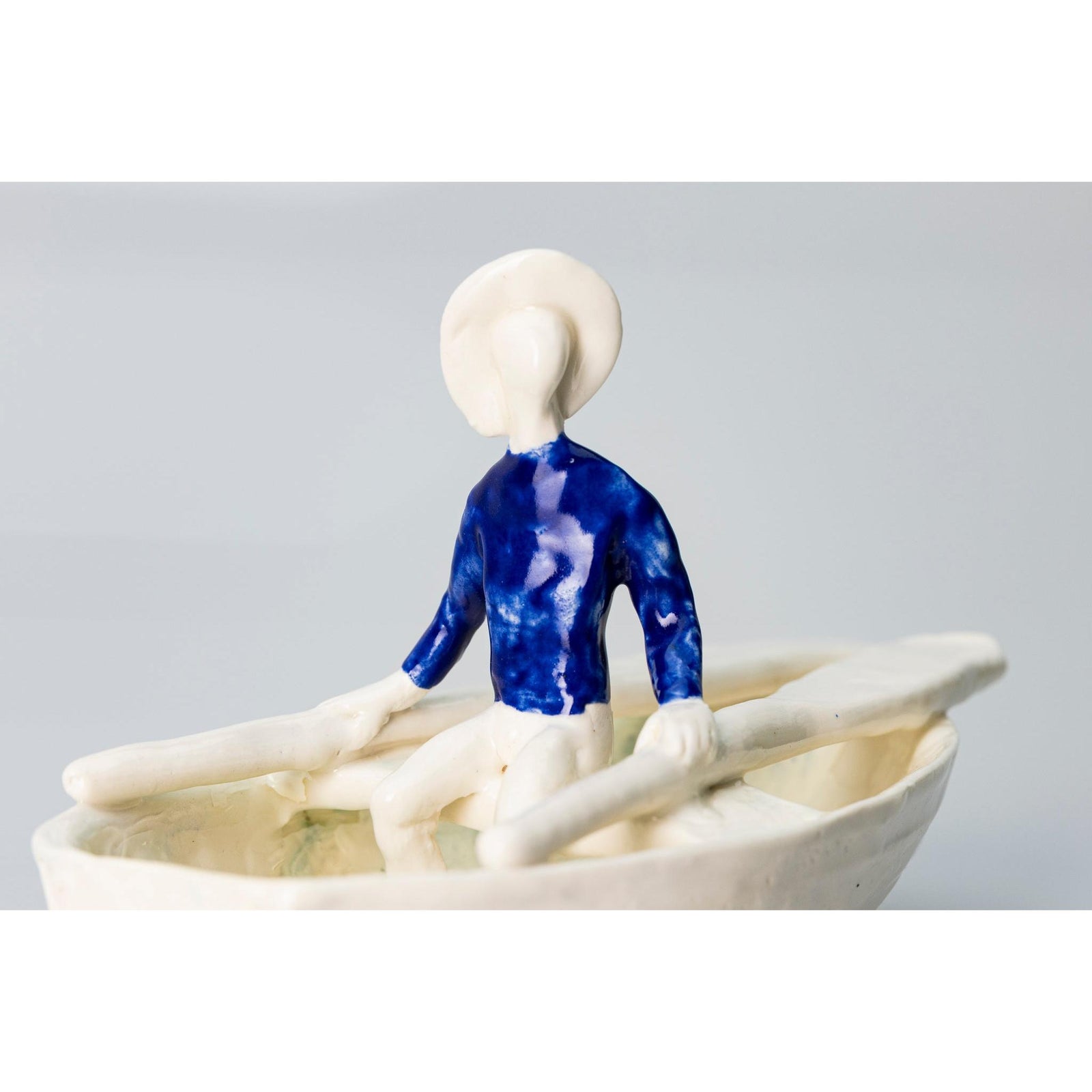 'Little Boat with Blue Man (SH62)' Stoneware Boat by Sophie Howard, available from Padstow Gallery, Cornwall