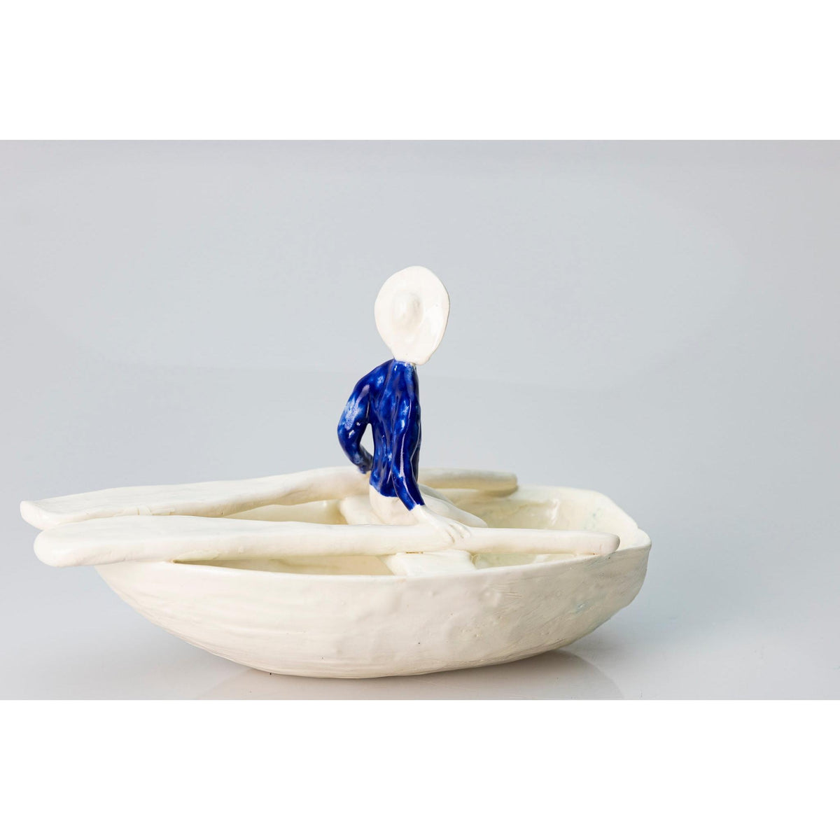 'Little Boat with Blue Man (SH62)' Stoneware Boat by Sophie Howard, available from Padstow Gallery, Cornwall