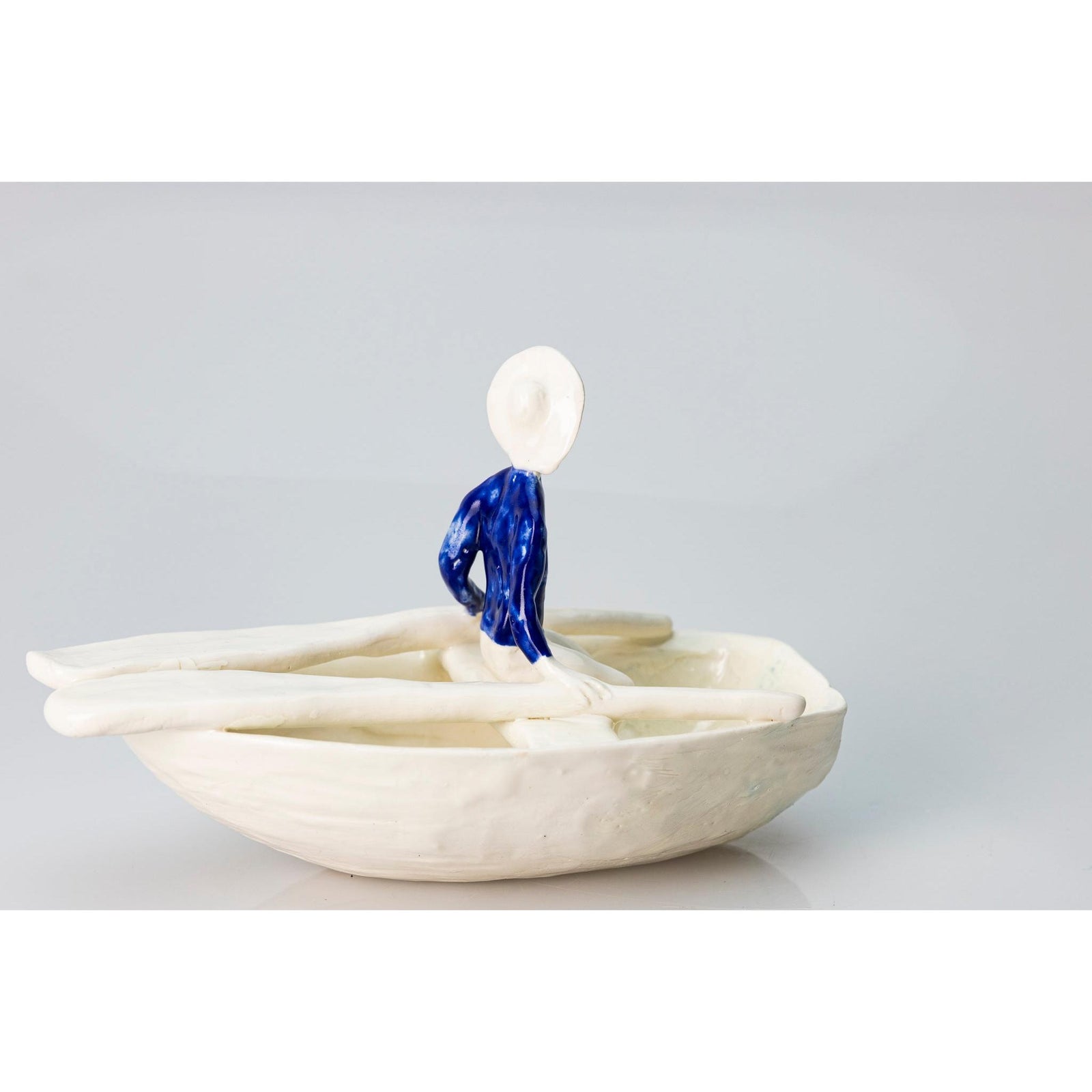 'Little Boat with Blue Man (SH62)' Stoneware Boat by Sophie Howard, available from Padstow Gallery, Cornwall