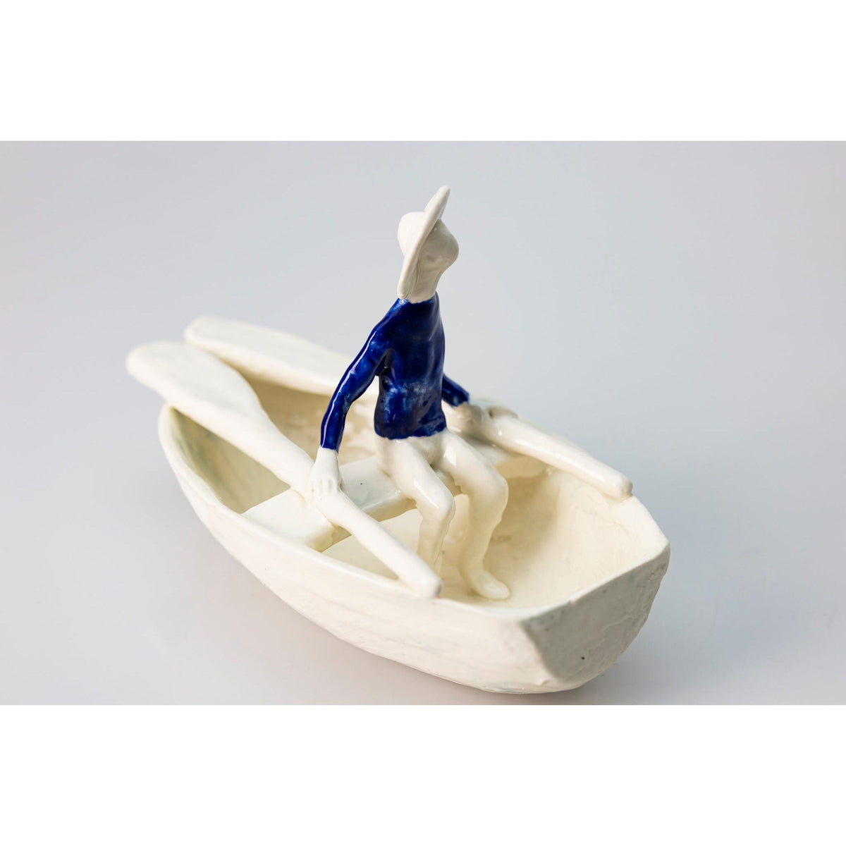 'Little Boat with Blue Man (SH62)' Stoneware Boat by Sophie Howard, available from Padstow Gallery, Cornwall