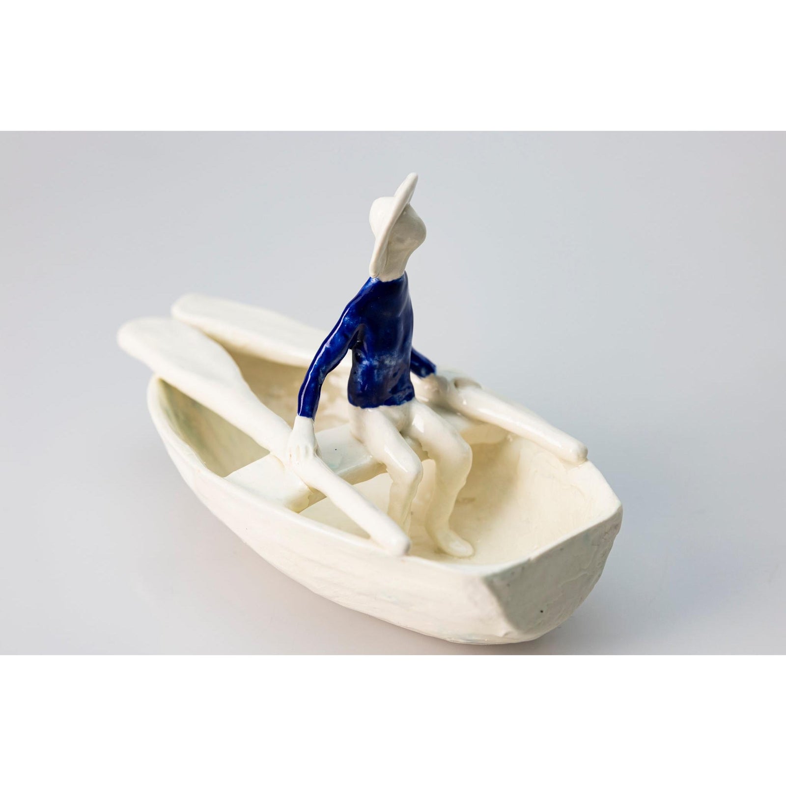 'Little Boat with Blue Man (SH62)' Stoneware Boat by Sophie Howard, available from Padstow Gallery, Cornwall