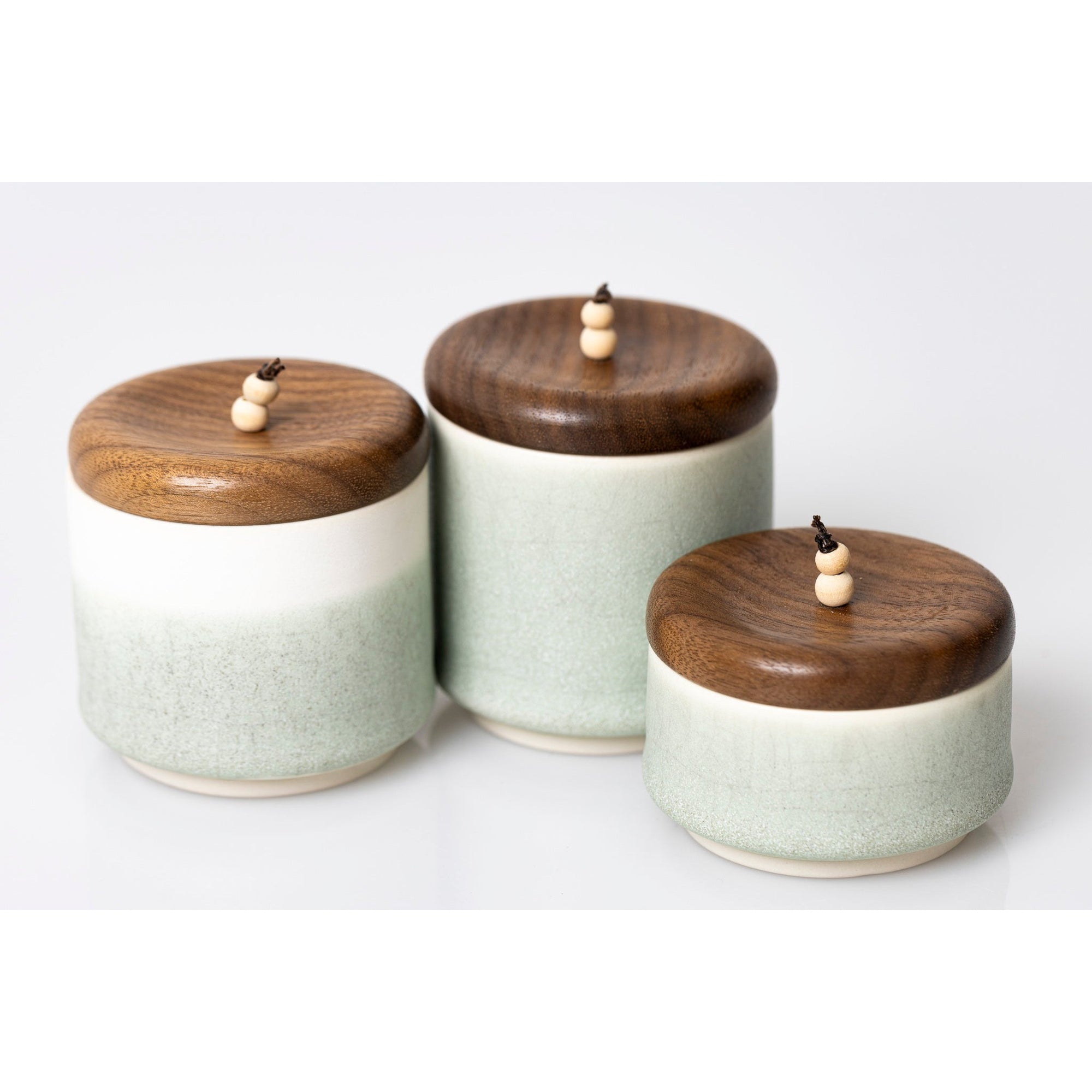 MM2, MM1 and MM3 Medium White/Sea Green Pot with Walnut Beaded Lid by Kate Schuricht ceramics available at Padstow Gallery, Cornwall