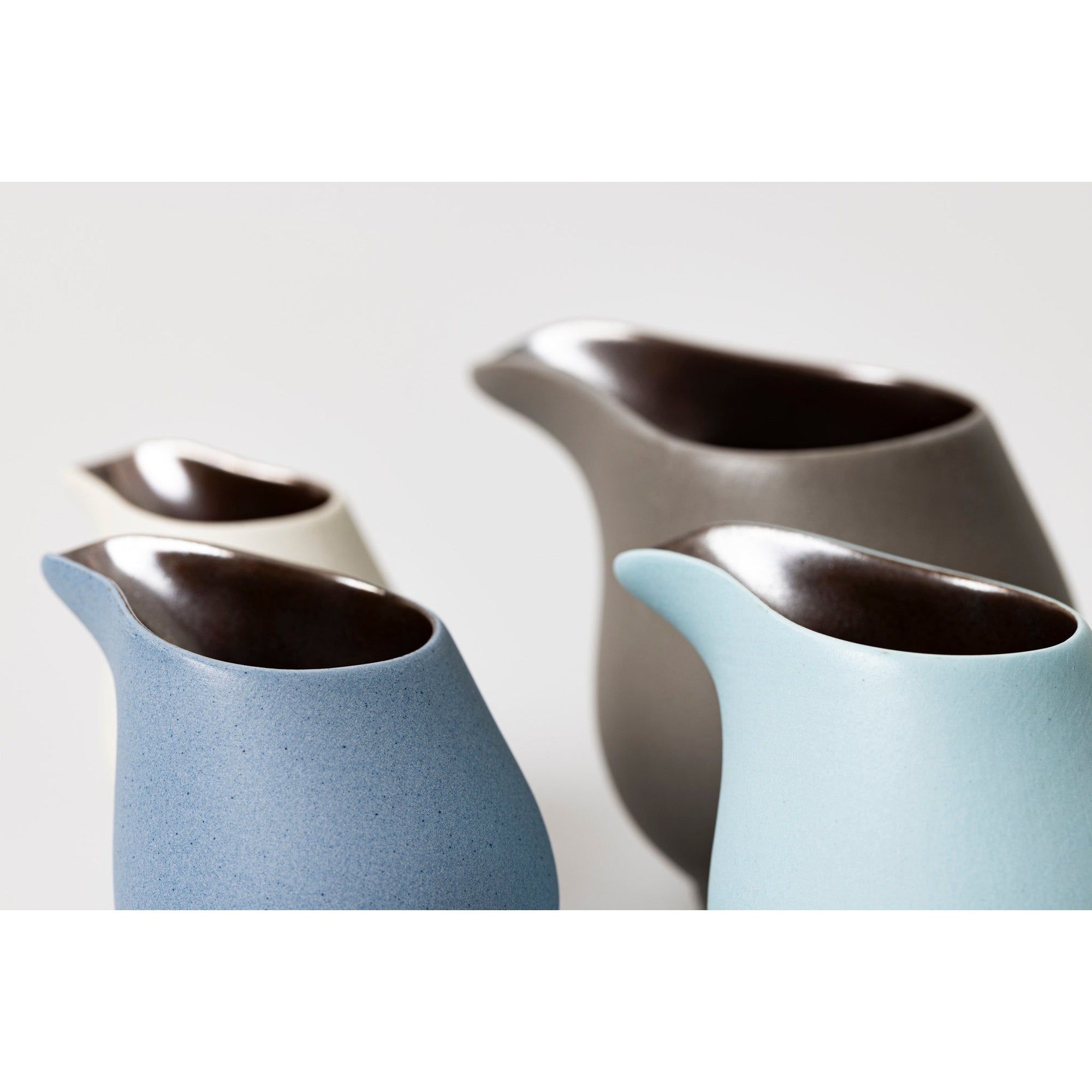 RR3, RR2, RR1 and RR4 Flow Lustre Stoneware Jug by Kate Schuricht ceramics available at Padstow Gallery, Cornwall