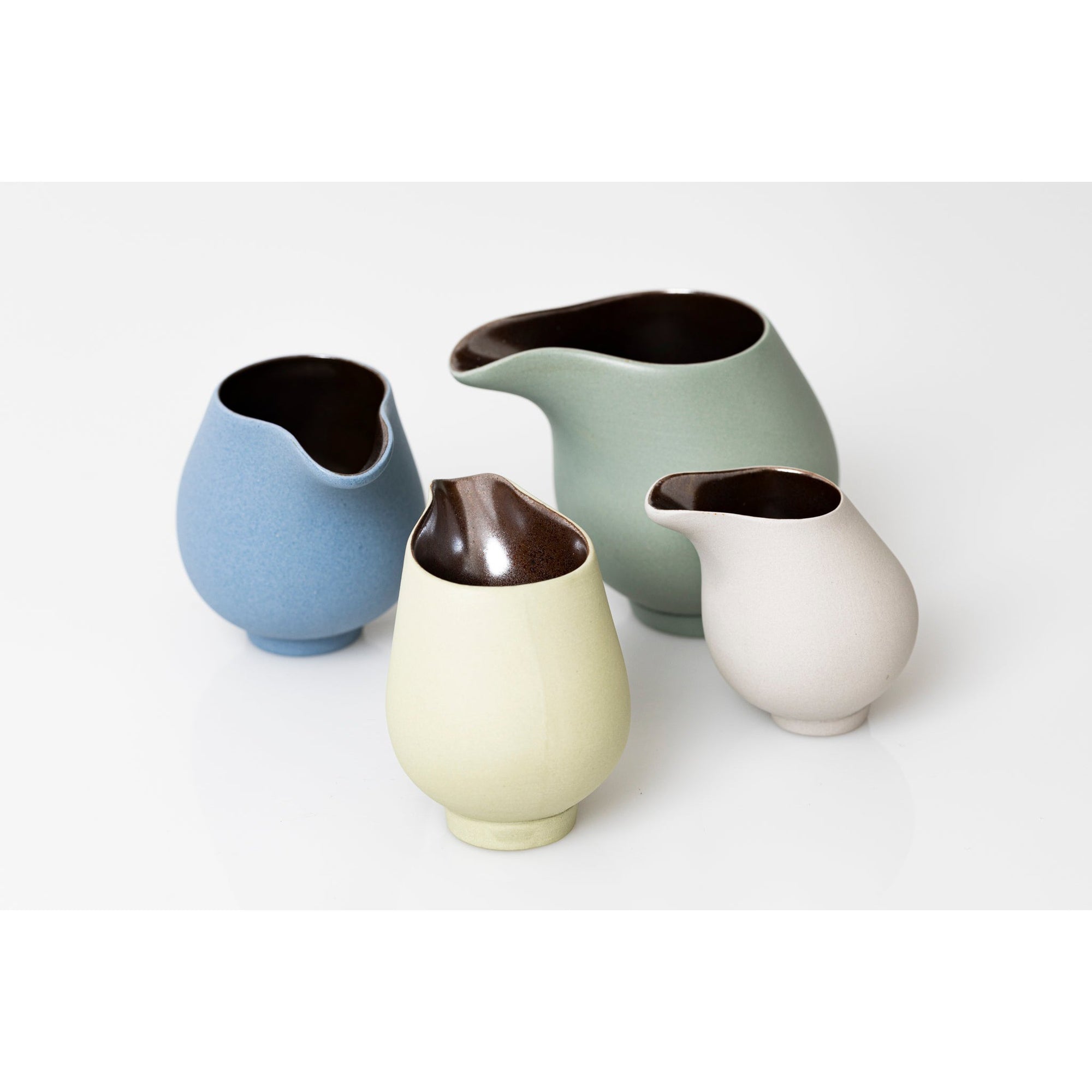 QQ4, QQ3, QQ2 and QQ1 Flow Lustre Stoneware Jug by Kate Schuricht ceramics available at Padstow Gallery, Cornwall