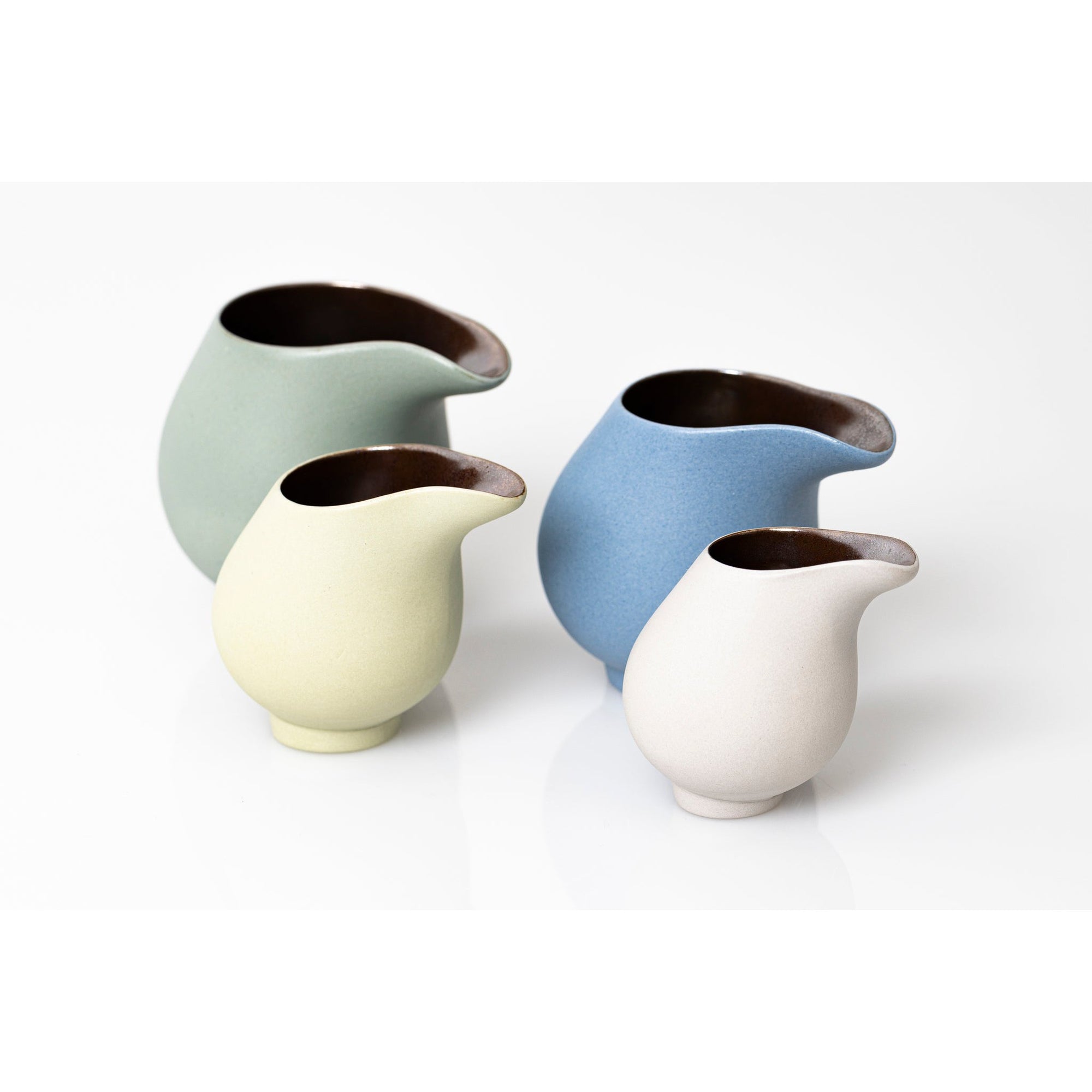 QQ1, QQ2, QQ3 and QQ4 Flow Lustre Stoneware Jug by Kate Schuricht ceramics available at Padstow Gallery, Cornwall