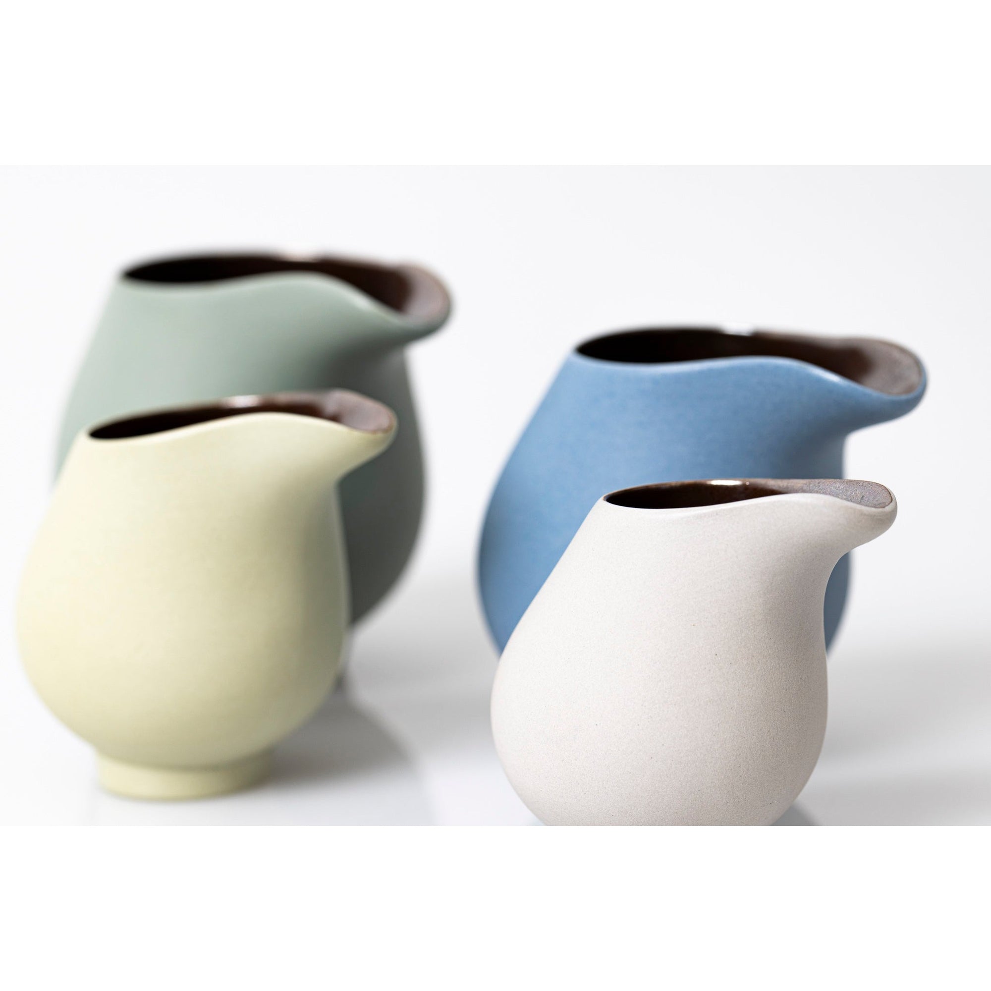 QQ2, QQ1, QQ3 and QQ4 Flow Lustre Stoneware Jug by Kate Schuricht ceramics available at Padstow Gallery, Cornwall