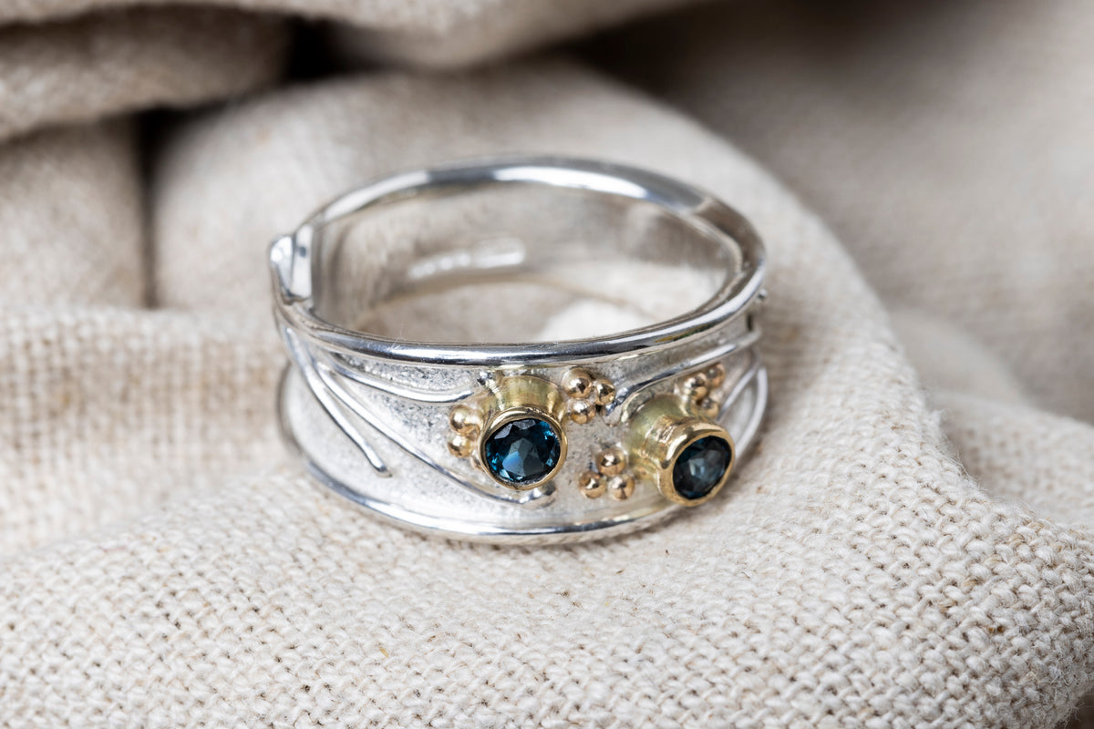 LG121 London blue topaz silver and 9ct gold ring