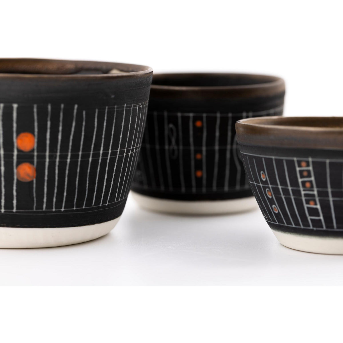 SC11 Sgraffitto Orange Pop Cup by Sarah Cooling available at Padstow Gallery, Cornwall