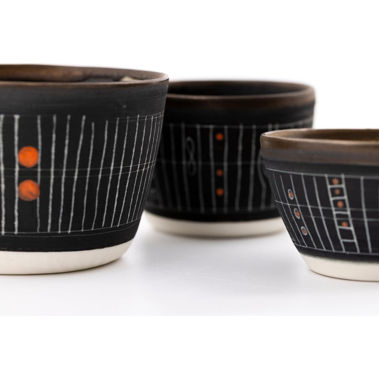 SC11 Sgraffitto Orange Pop Cup by Sarah Cooling available at Padstow Gallery, Cornwall