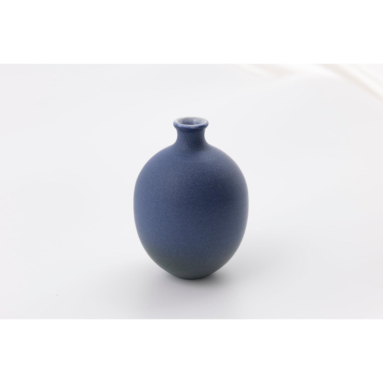 'LB215 Deep Sea Blue Oval vase' by Lucy Burley ceramics, available at Padstow Gallery, Cornwall