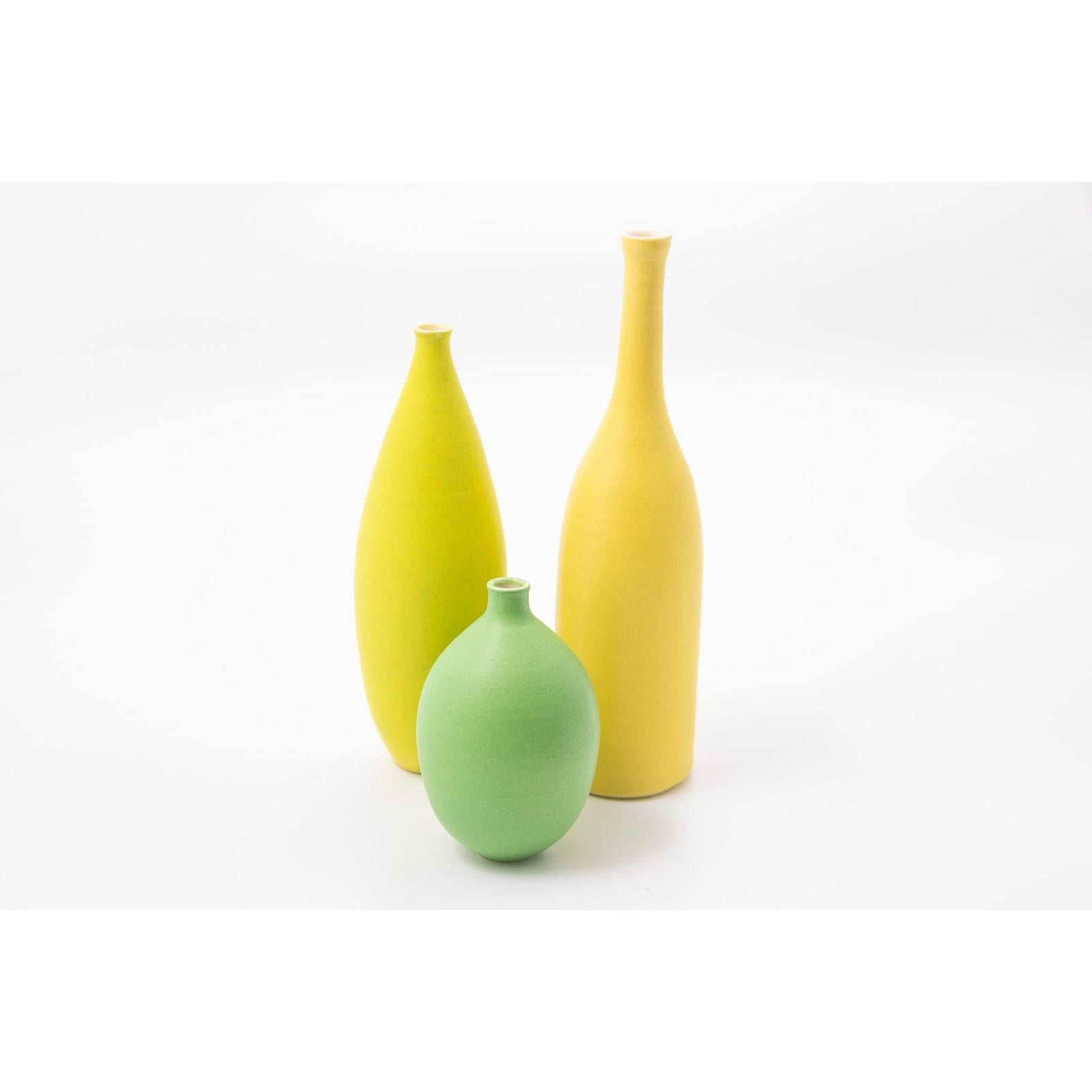 'LB202 Pistachio tall slim oval vase' by Lucy Burley ceramics, available at Padstow Gallery, Cornwall