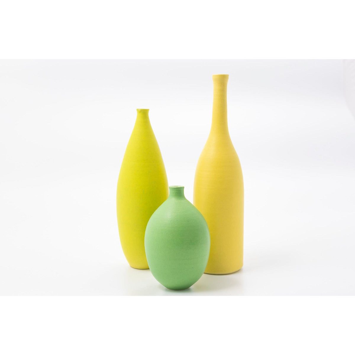 'LB197 Primrose Yellow bottle' by Lucy Burley ceramics, available at Padstow Gallery, Cornwall